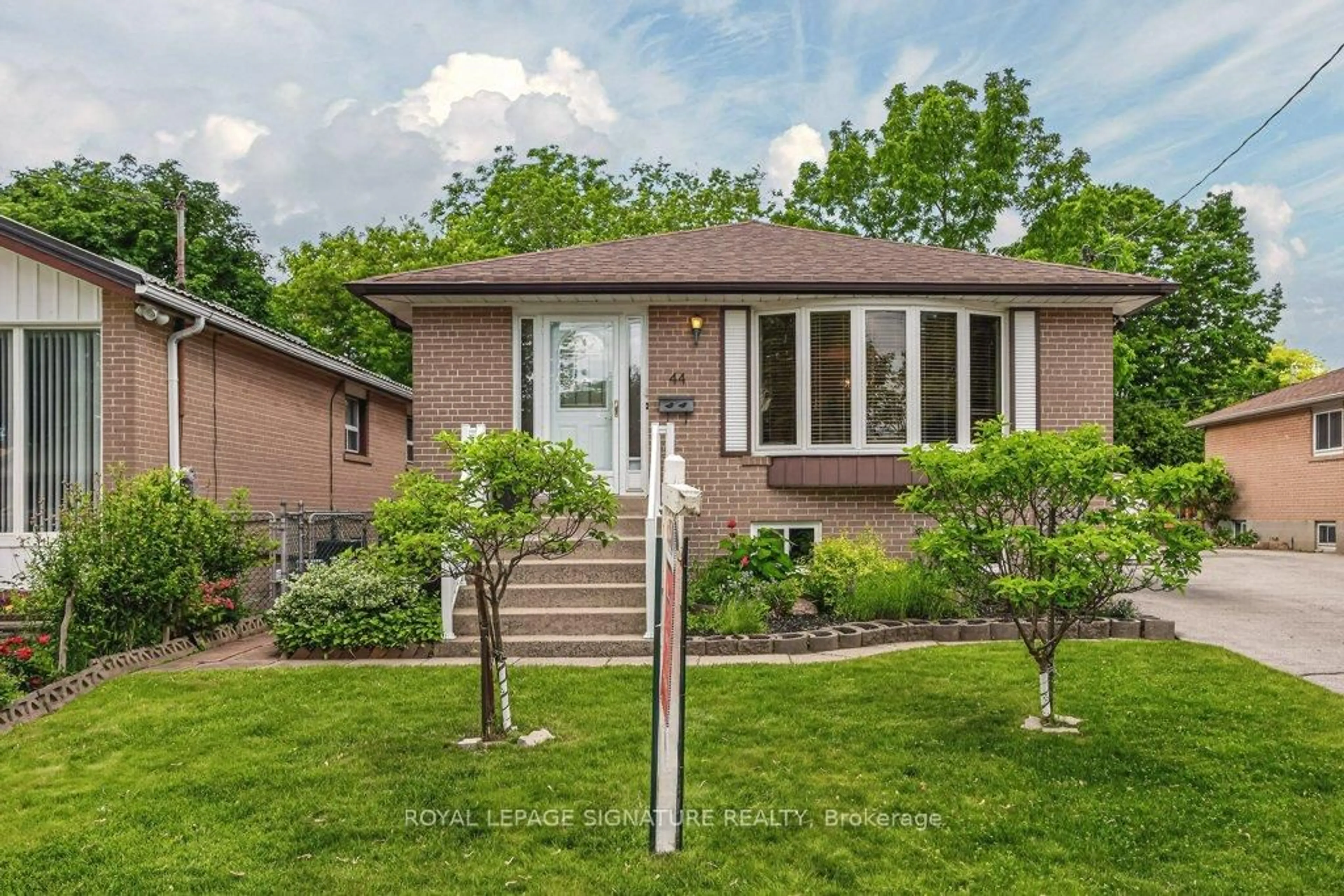 Home with brick exterior material, street for 44 Rowallan Dr, Toronto Ontario M1E 2Y6