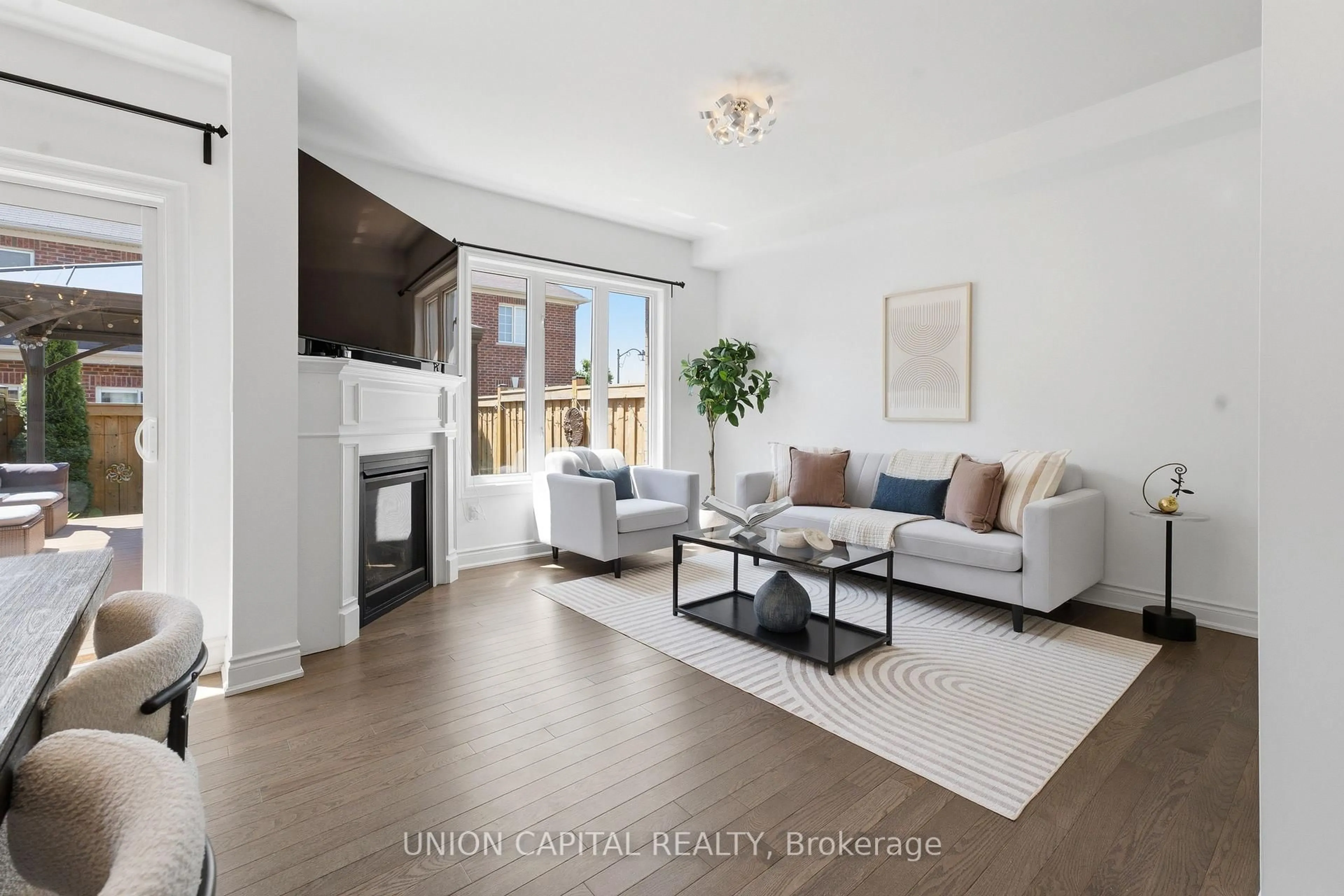 Living room with furniture, unknown for 22 Delight Way, Whitby Ontario L1M 0E9
