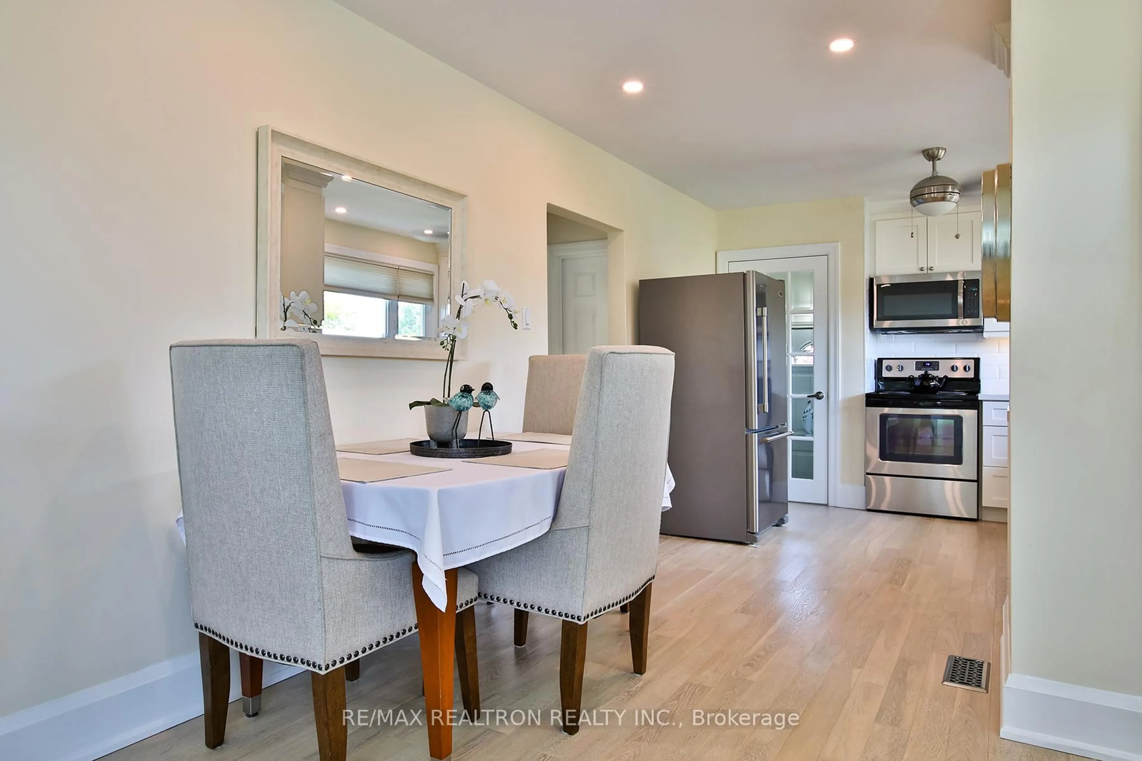 Open concept kitchen, wood/laminate floor for 744 Shelley Ave, Oshawa Ontario L1H 3J6