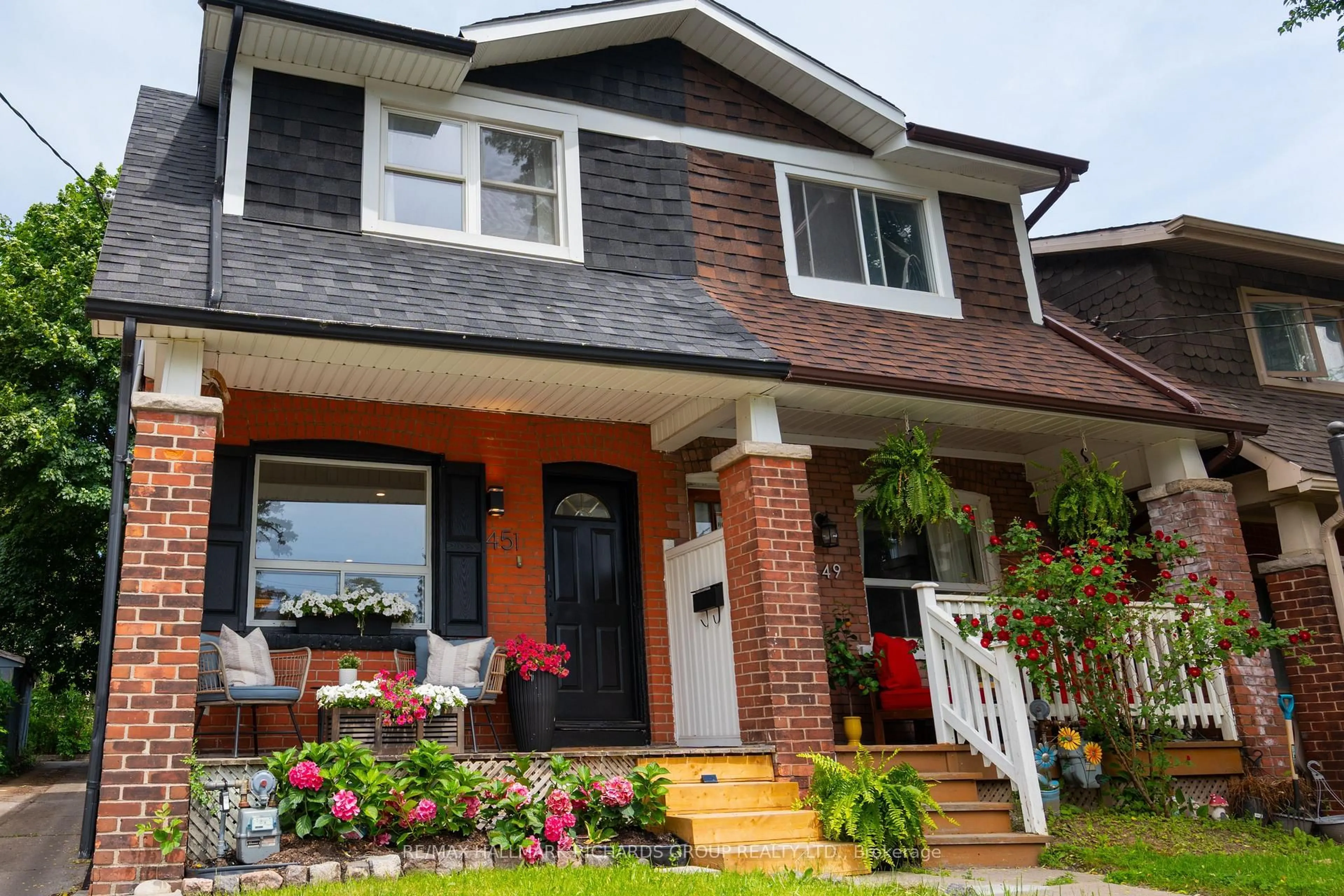 Home with brick exterior material, street for 451 Ashdale Ave, Toronto Ontario M4L 2Z3