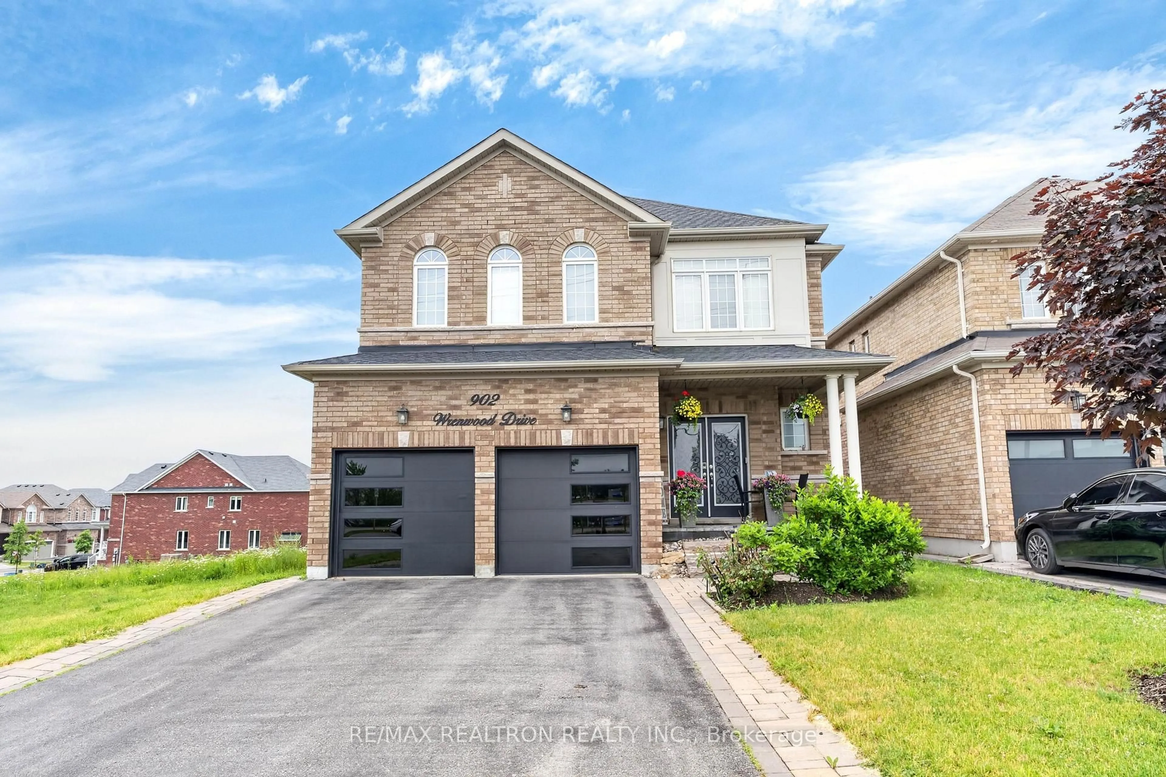 Home with brick exterior material, street for 902 Wrenwood Dr, Oshawa Ontario L1K 0W1