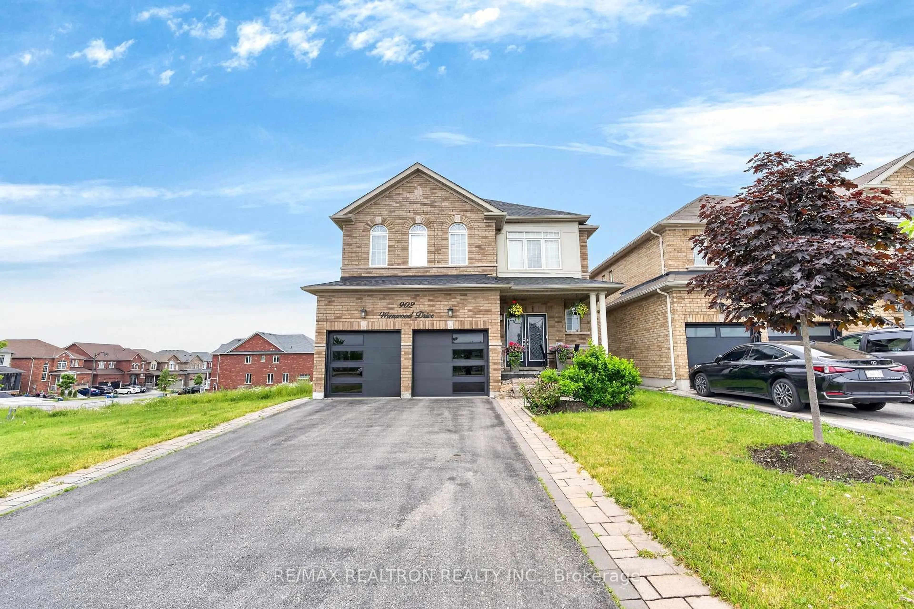 Home with brick exterior material, street for 902 Wrenwood Dr, Oshawa Ontario L1K 0W1