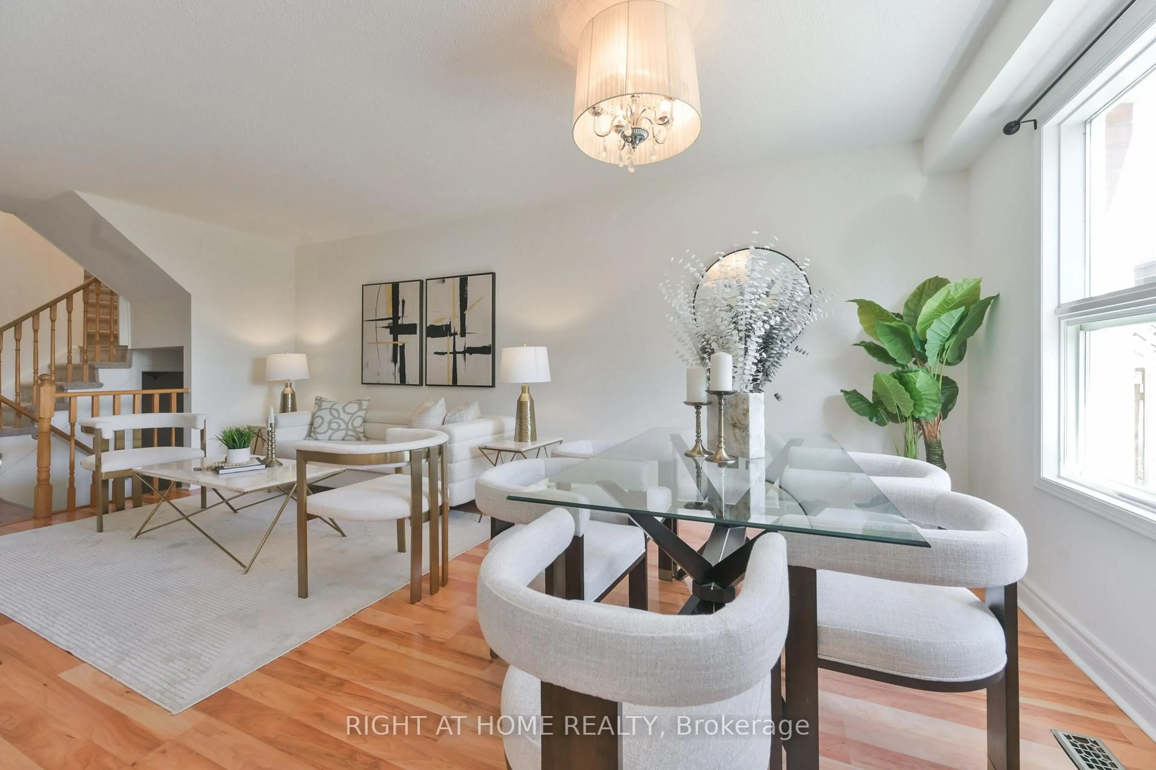 Living room with furniture, wood/laminate floor for 112 Creekwood Cres, Whitby Ontario L1R 2K4