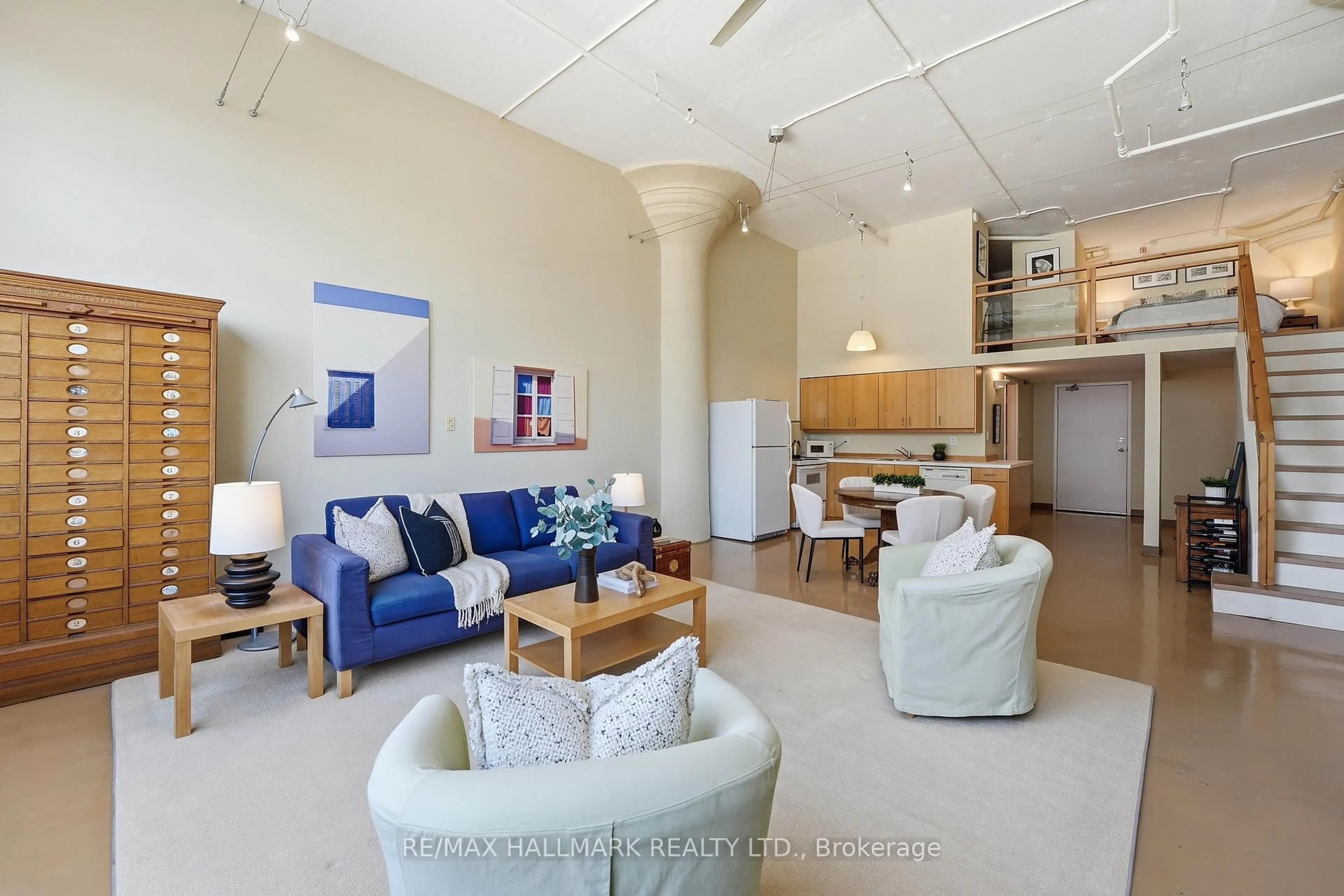 Living room with furniture, unknown for 245 Carlaw Ave #203, Toronto Ontario M4M 2S6
