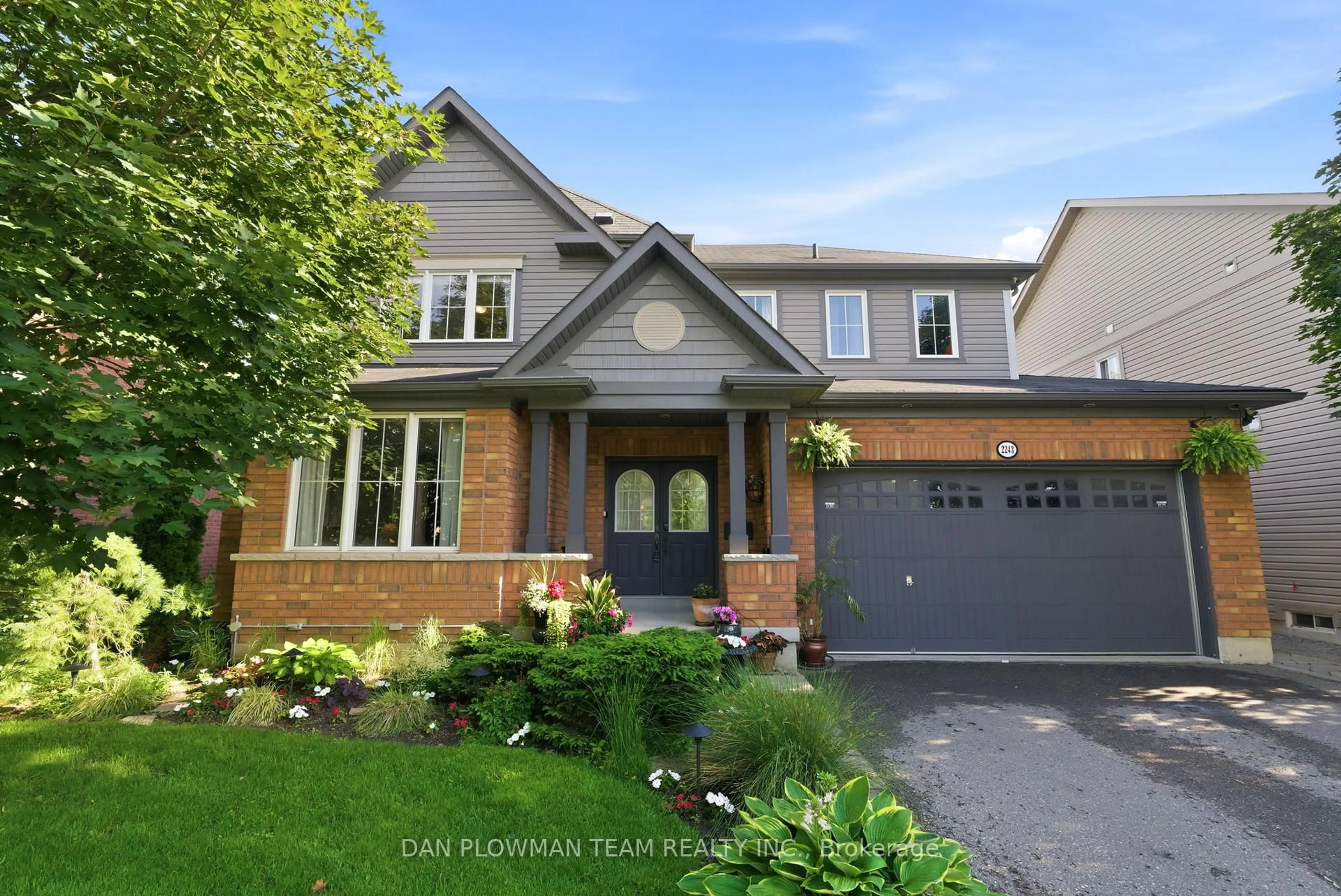 Home with brick exterior material, street for 2243 Pilgrim Sq, Oshawa Ontario L1L 0B5