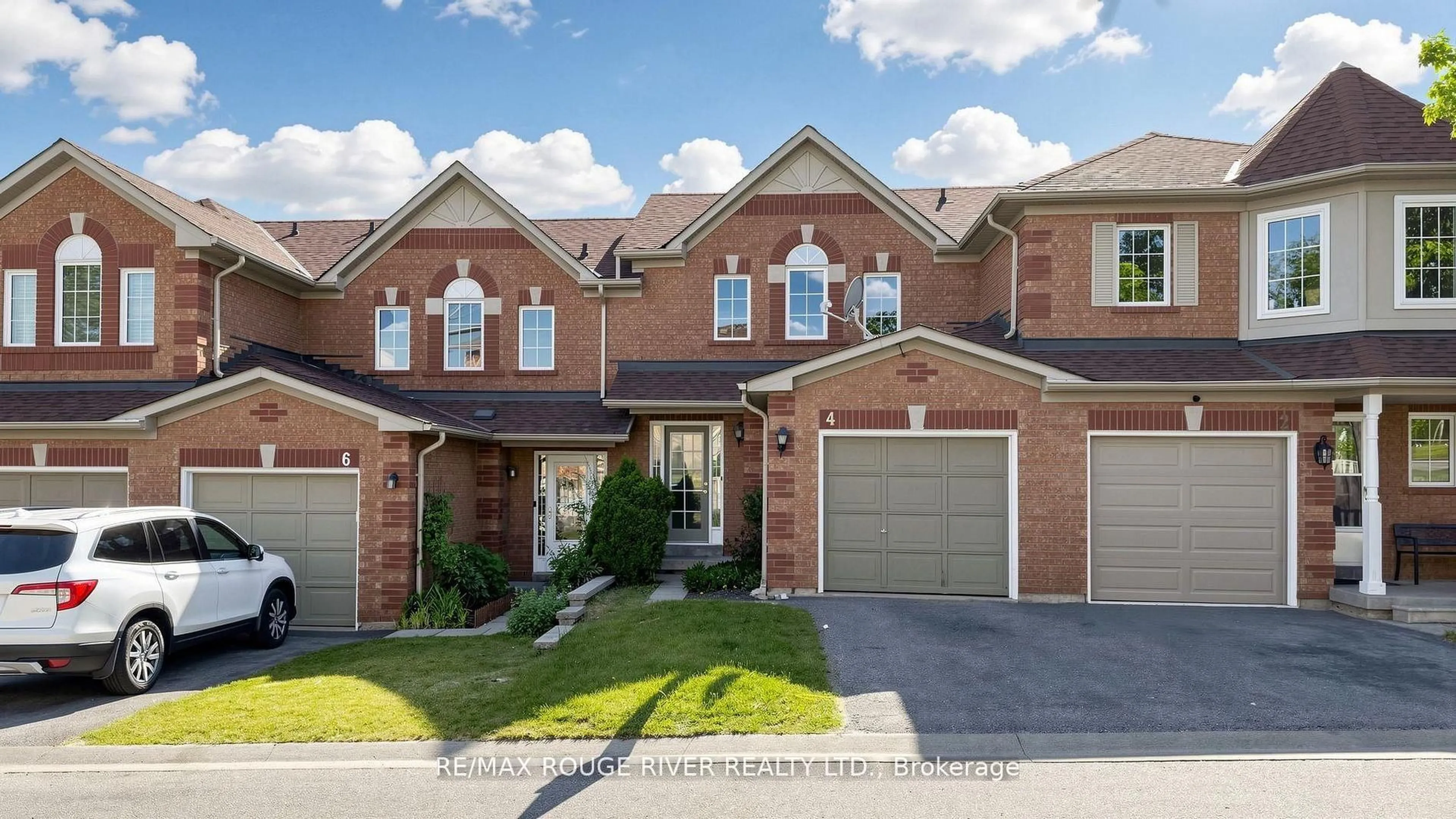 Home with brick exterior material, street for 4 Trowell Lane, Ajax Ontario L1Z 1K4