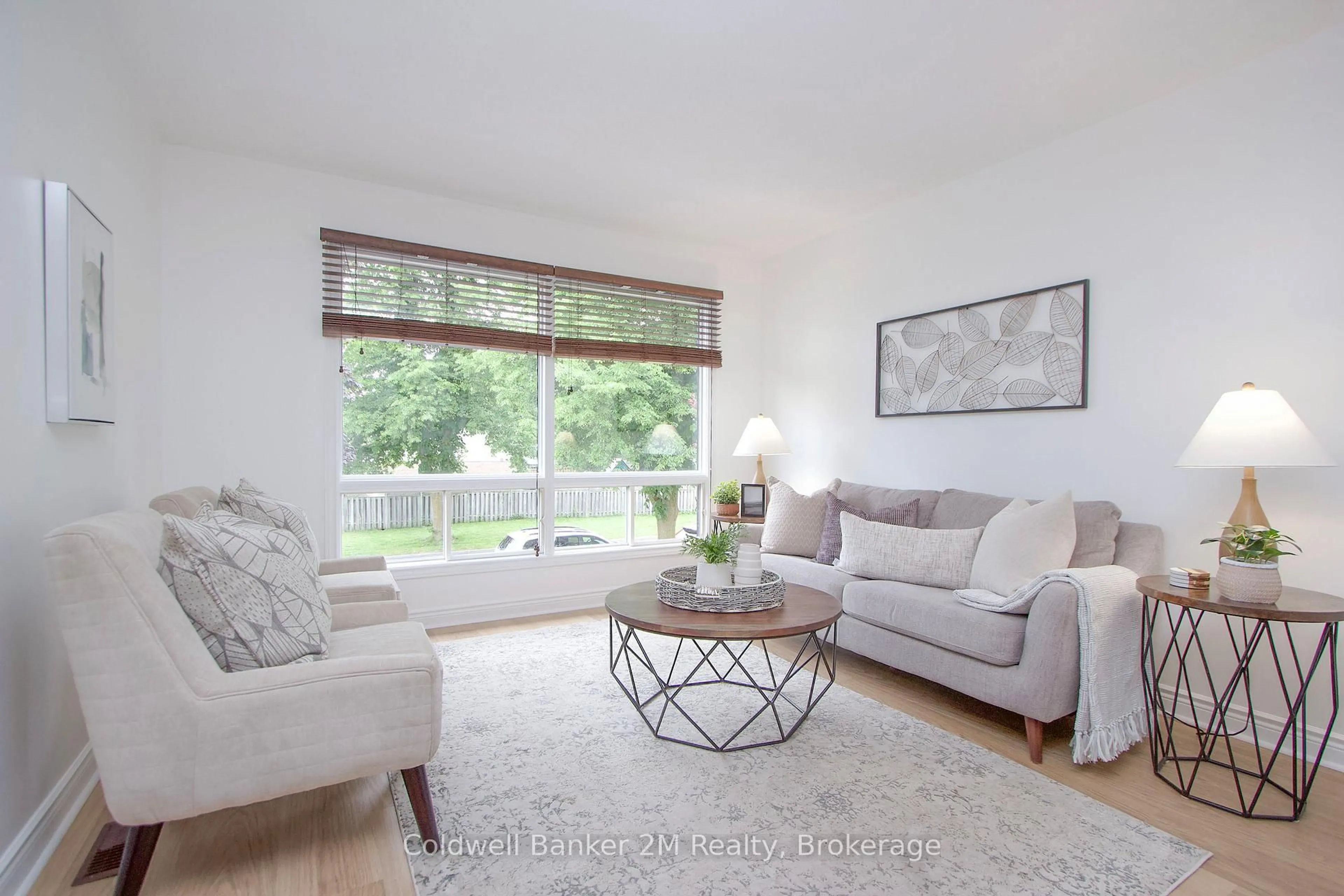 Living room with furniture, wood/laminate floor for 42 Kintyre St, Clarington Ontario L1E 2E4