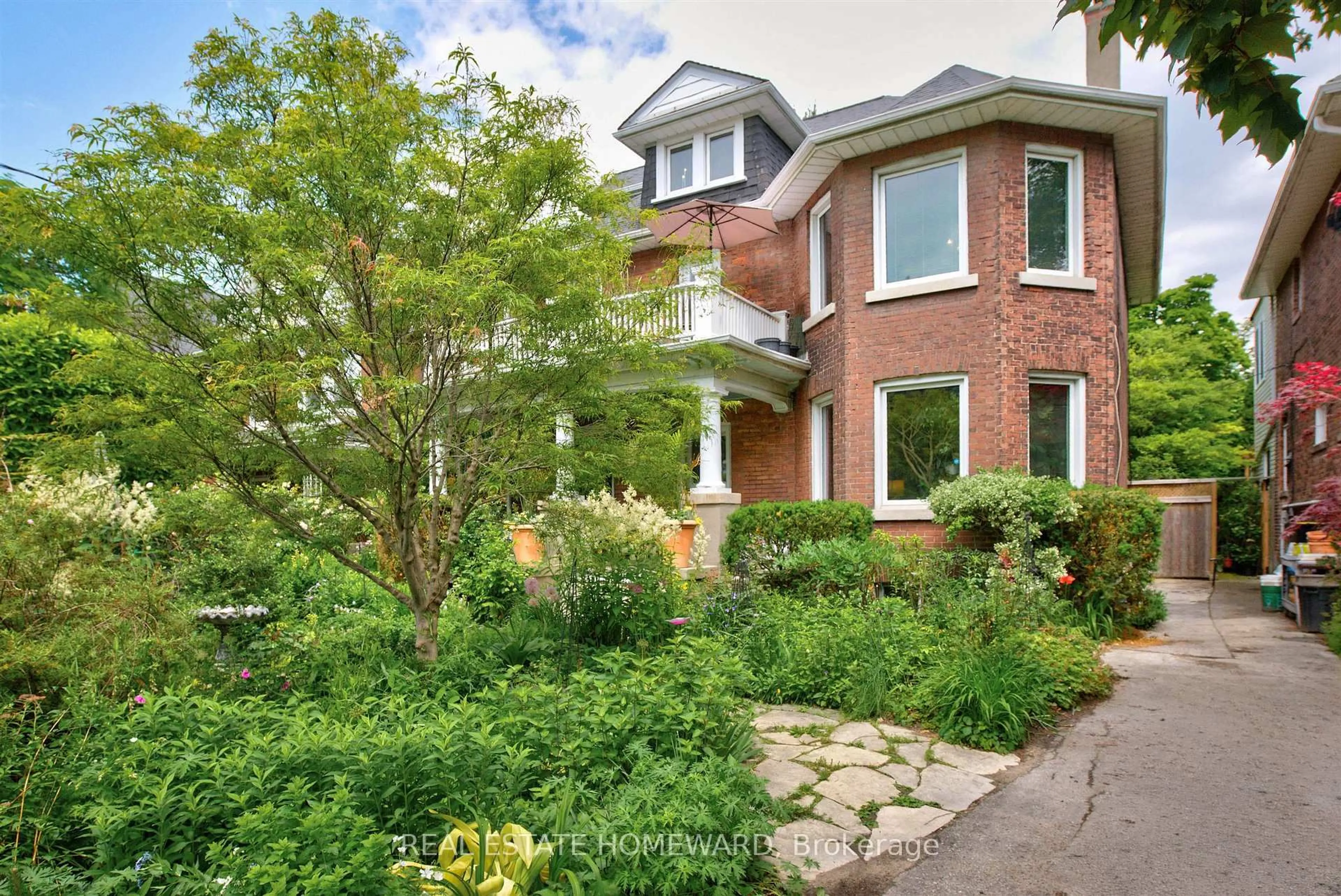 Home with brick exterior material, street for 14 Lyall Ave, Toronto Ontario M4E 1V8