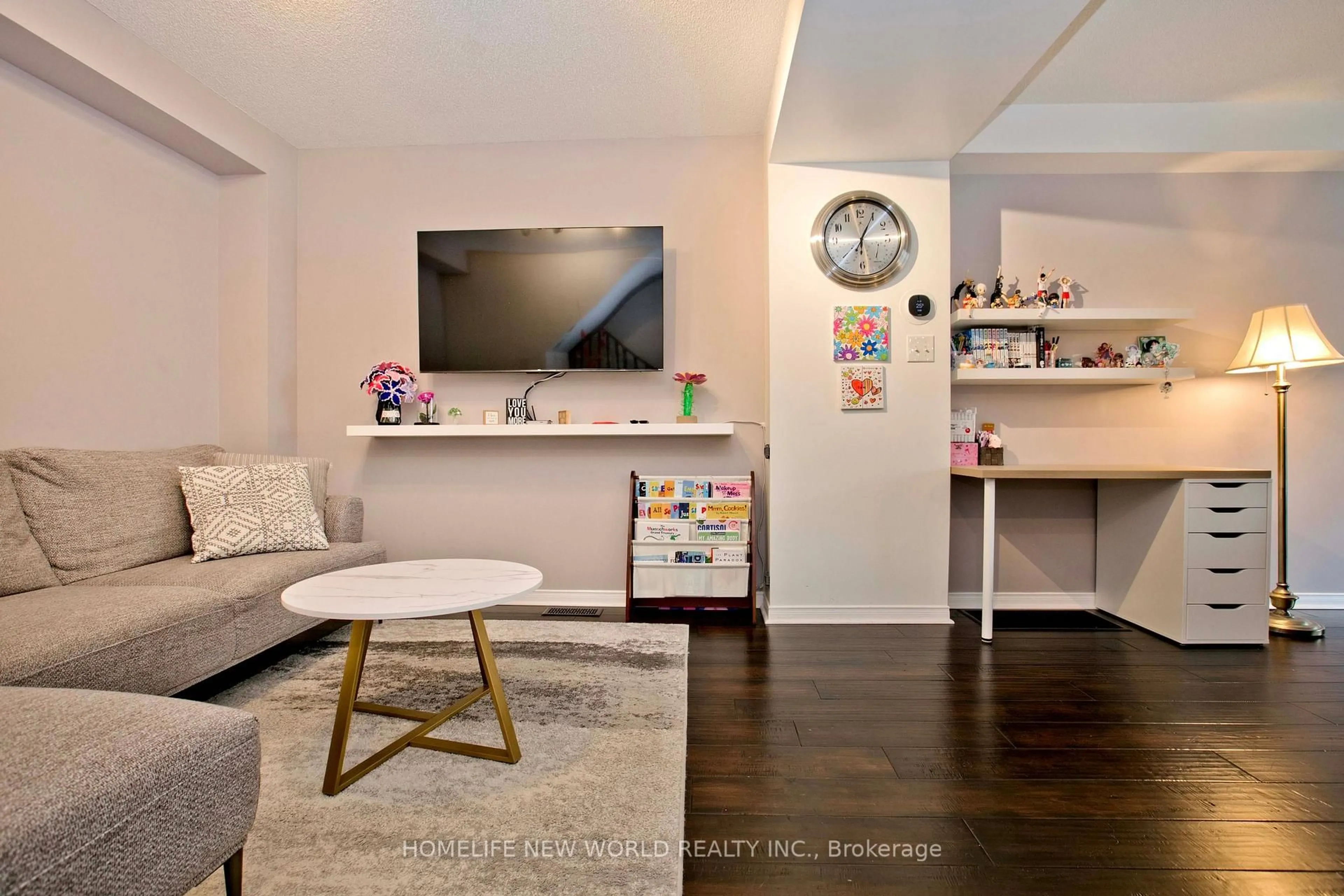 Living room with furniture, wood/laminate floor for 30 Linnell St, Ajax Ontario L1Z 0K8