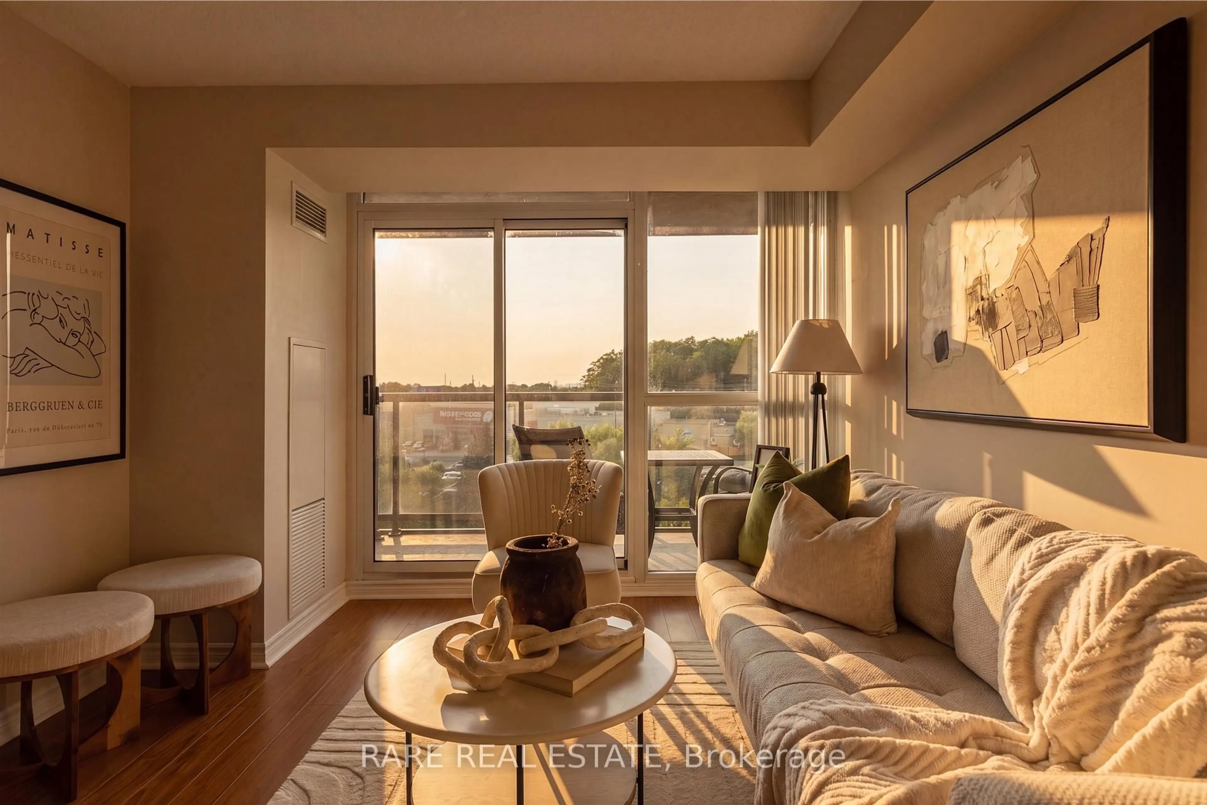 Living room with furniture, wood/laminate floor for 68 Grangeway Ave #703, Toronto Ontario M1H 0A1