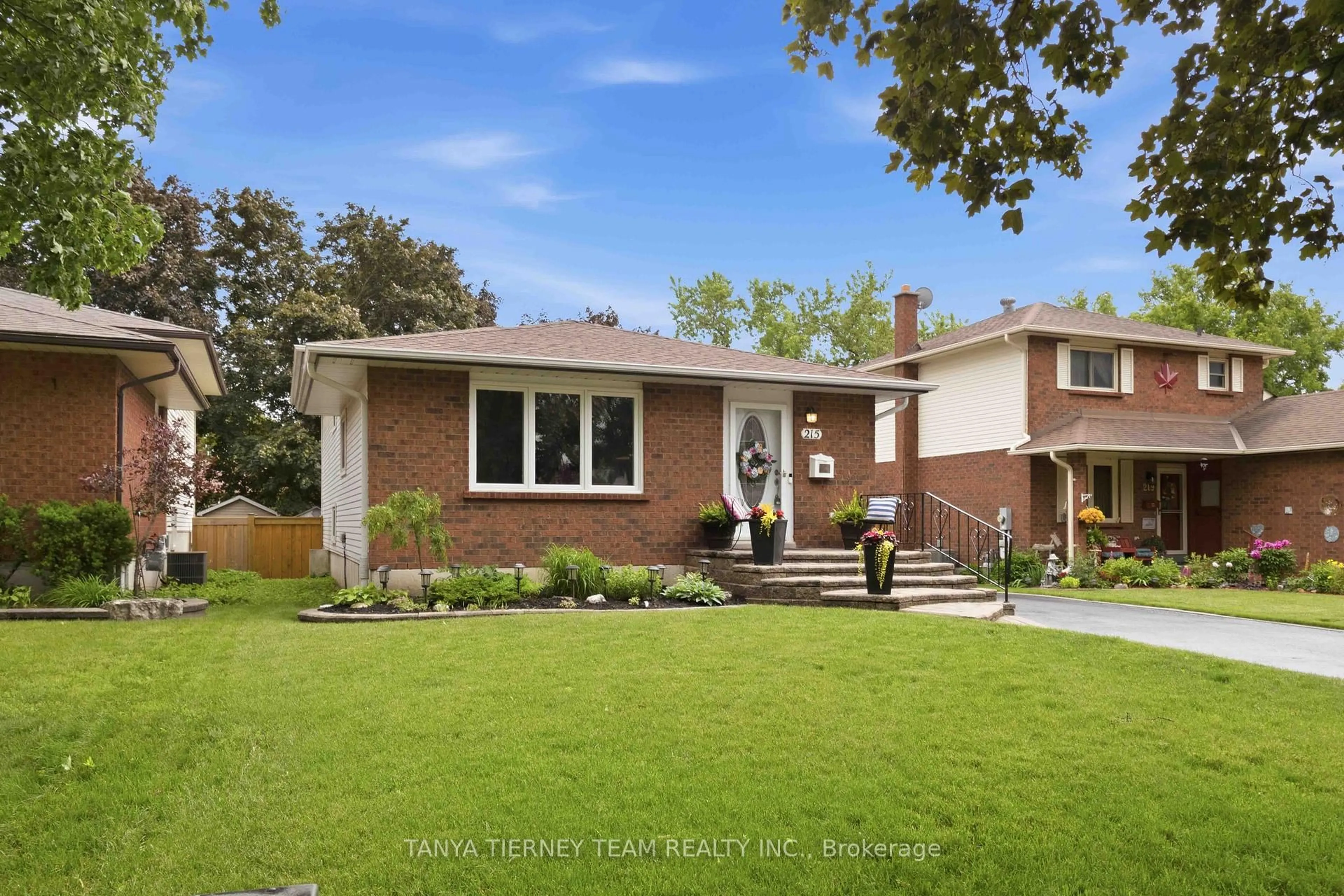 Home with brick exterior material, street for 215 Seneca Ave, Oshawa Ontario L1G 3V5