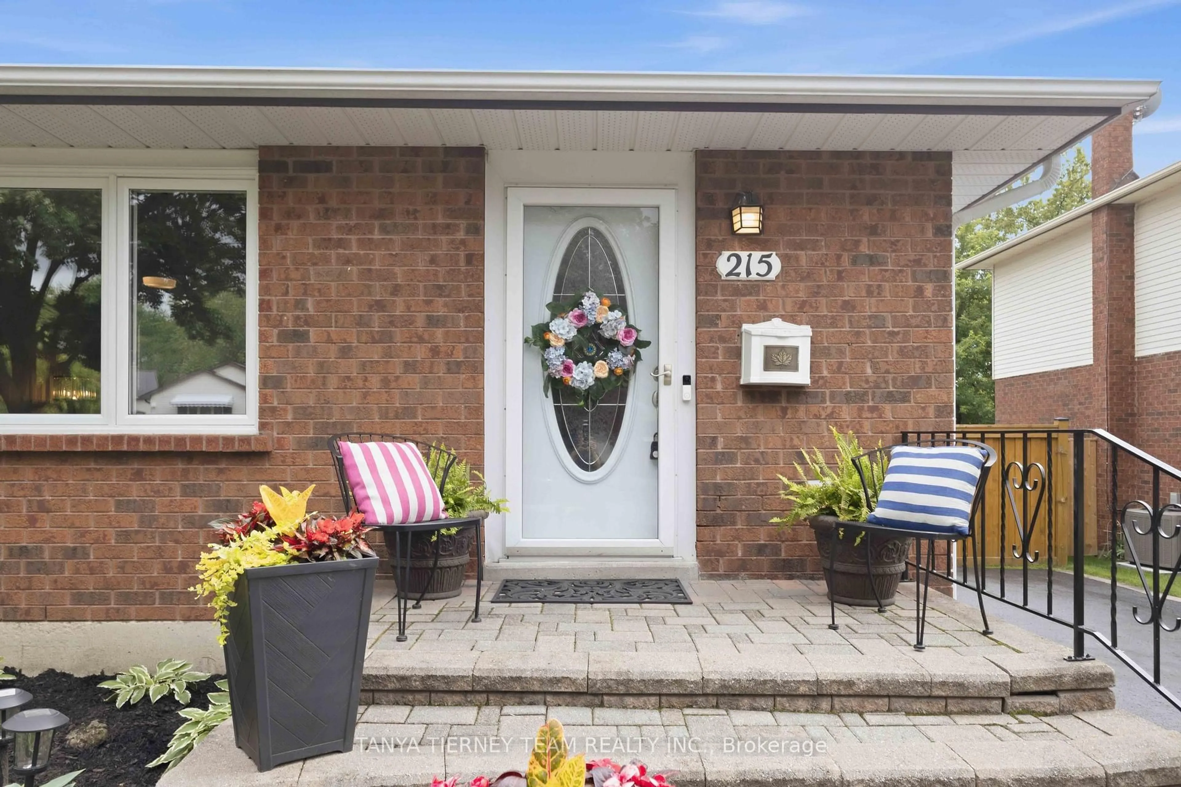 Home with brick exterior material, street for 215 Seneca Ave, Oshawa Ontario L1G 3V5