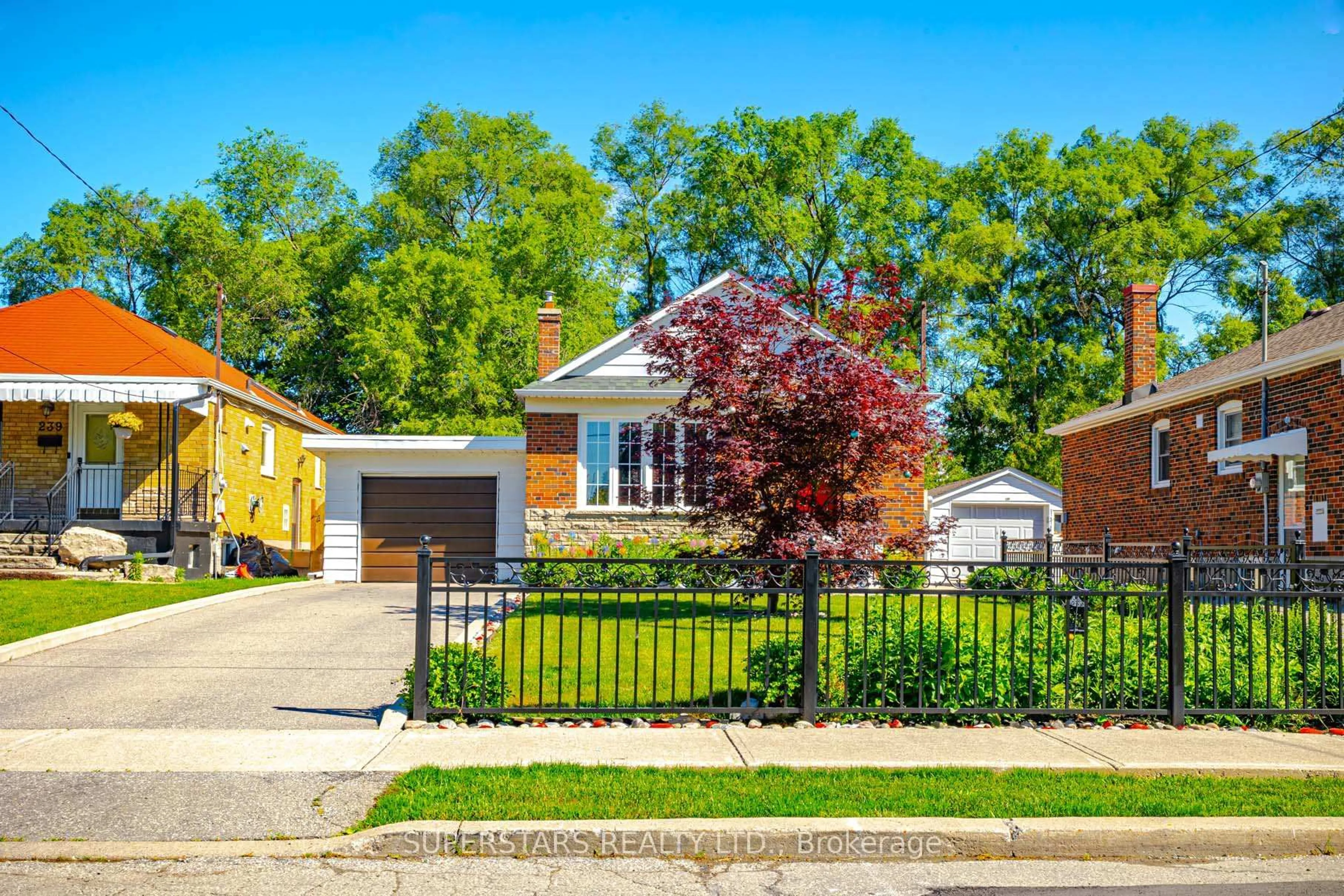Home with brick exterior material, street for 237 Ellington Dr, Toronto Ontario M1R 3Y2