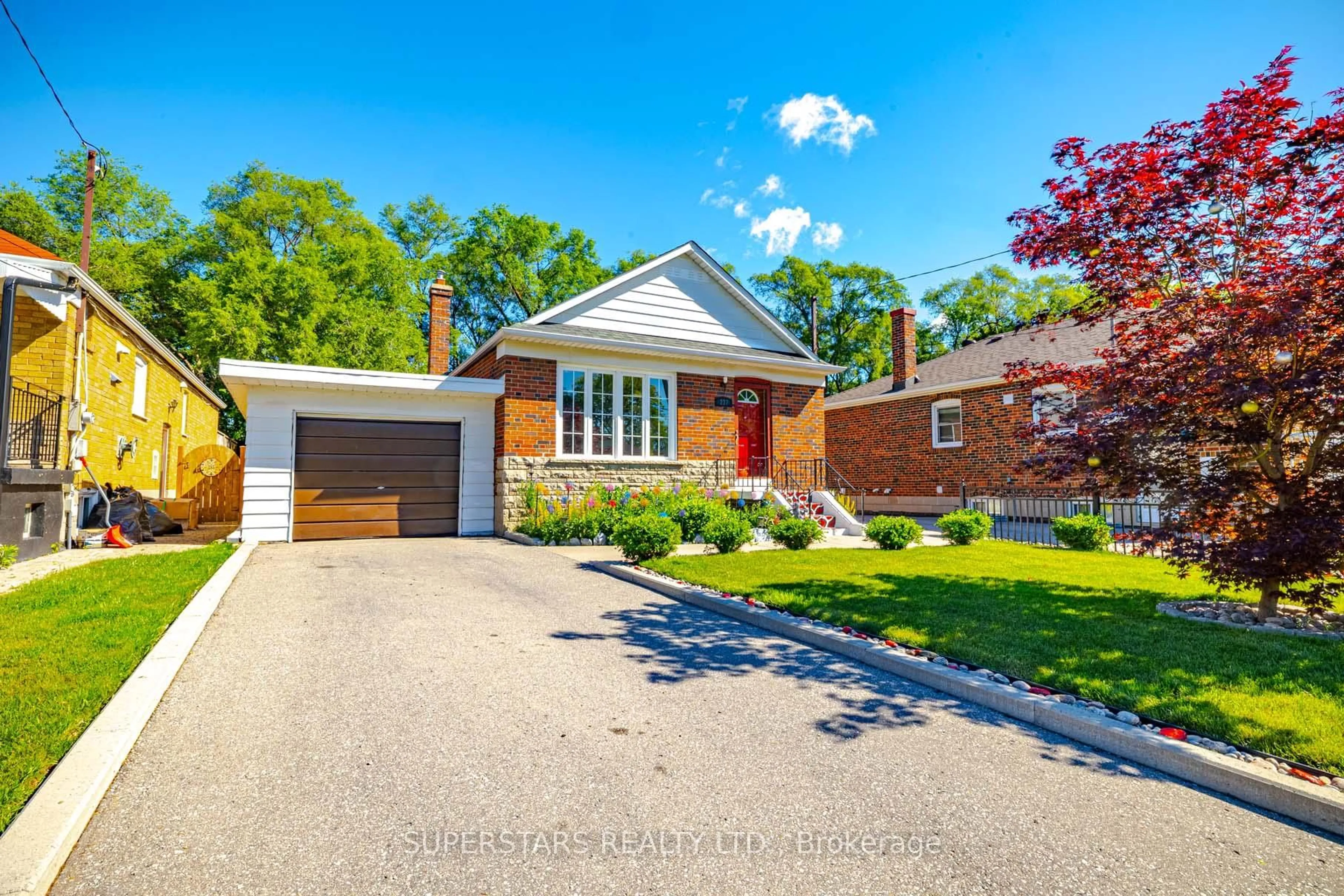 Home with brick exterior material, street for 237 Ellington Dr, Toronto Ontario M1R 3Y2