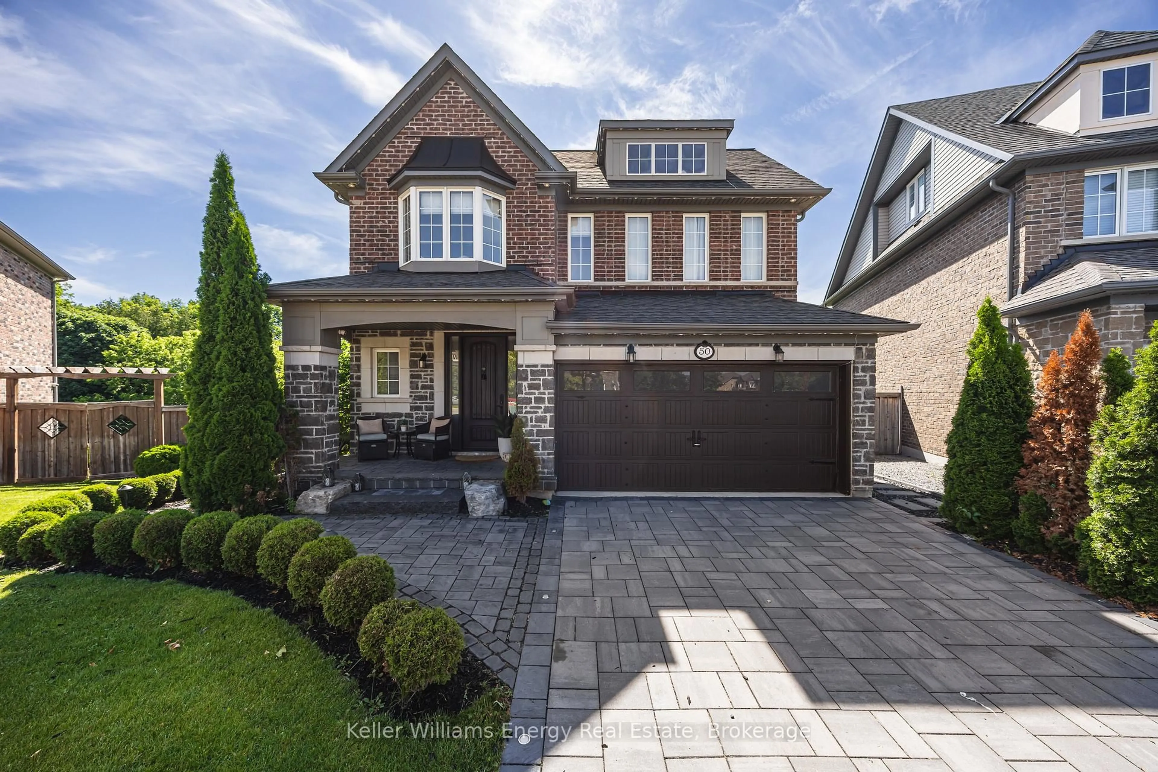 Home with brick exterior material, street for 50 Rumbellow Cres, Ajax Ontario L1Z 0P8