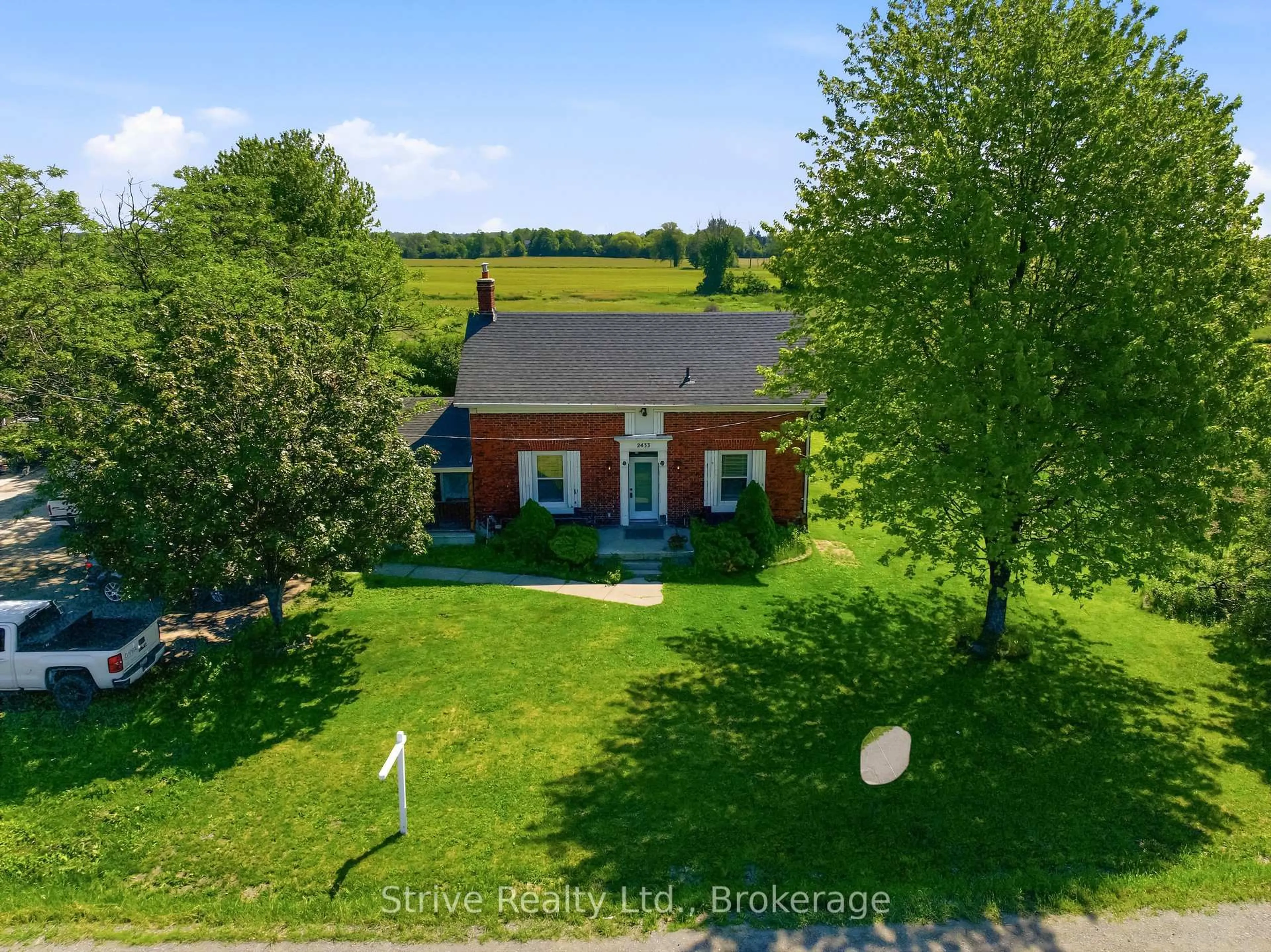 A pic from outside/outdoor area/front of a property/back of a property/a pic from drone, street for 2433 Courtice Rd, Clarington Ontario L1E 2M8
