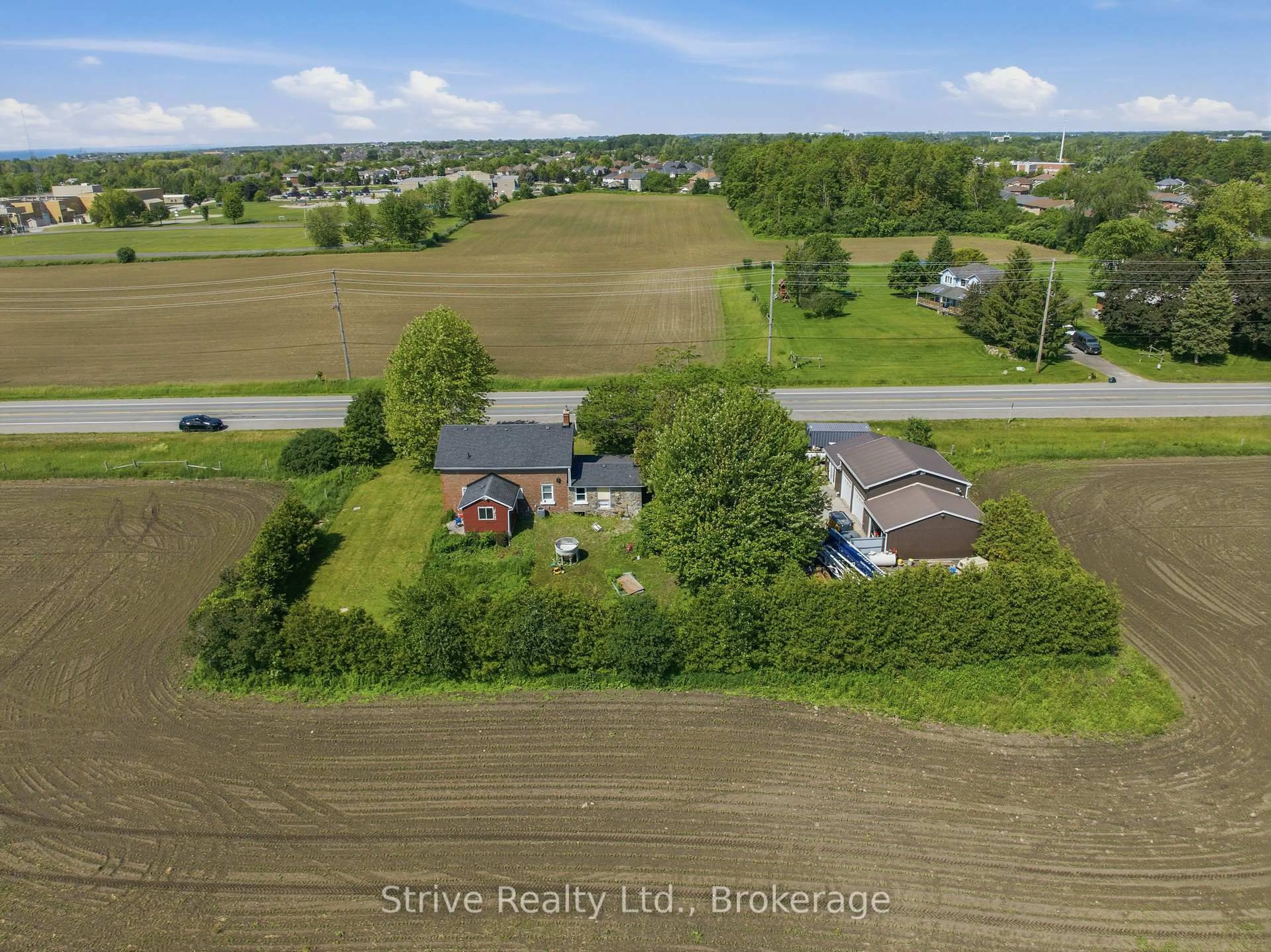 A pic from outside/outdoor area/front of a property/back of a property/a pic from drone, unknown for 2433 Courtice Rd, Clarington Ontario L1E 2M8
