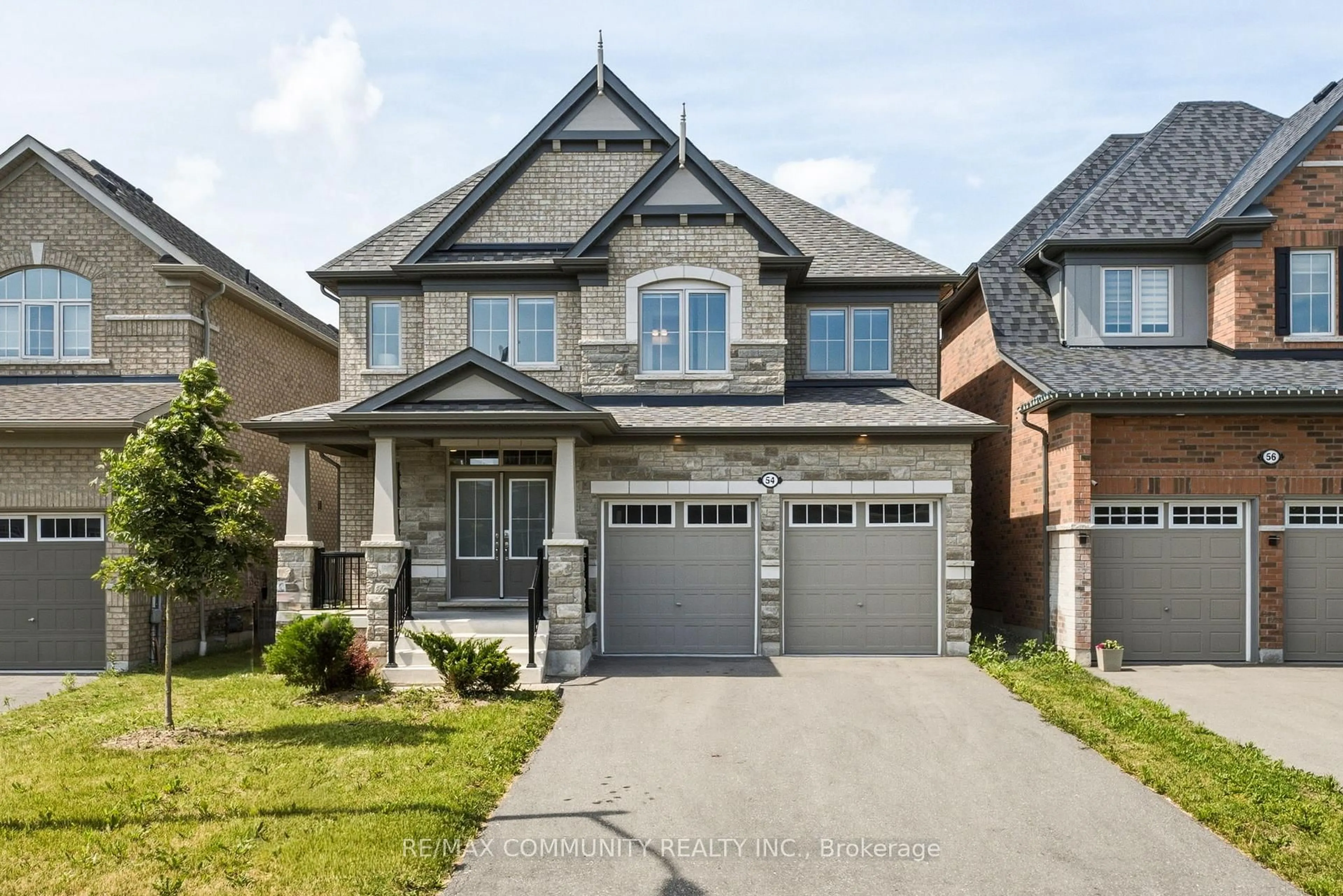 Home with brick exterior material, street for 54 Olerud Dr, Whitby Ontario L1P 0J1