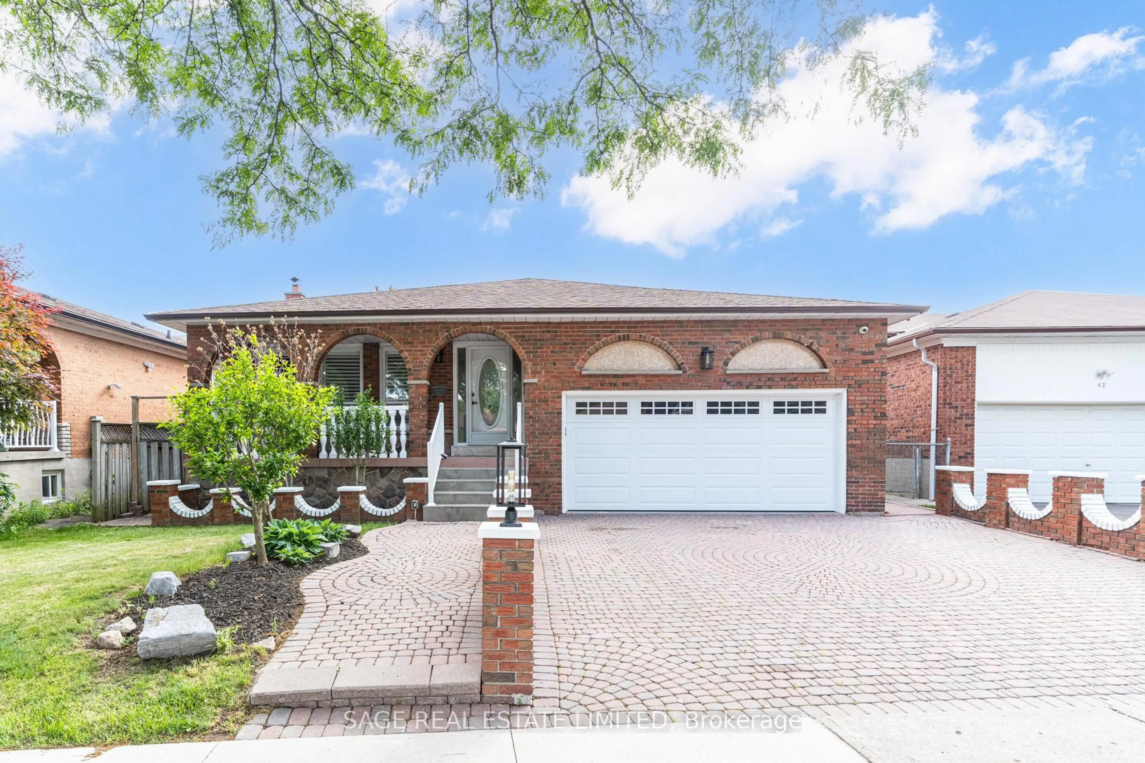 Home with brick exterior material, street for 40 Beamsville Dr, Toronto Ontario M1T 3S2