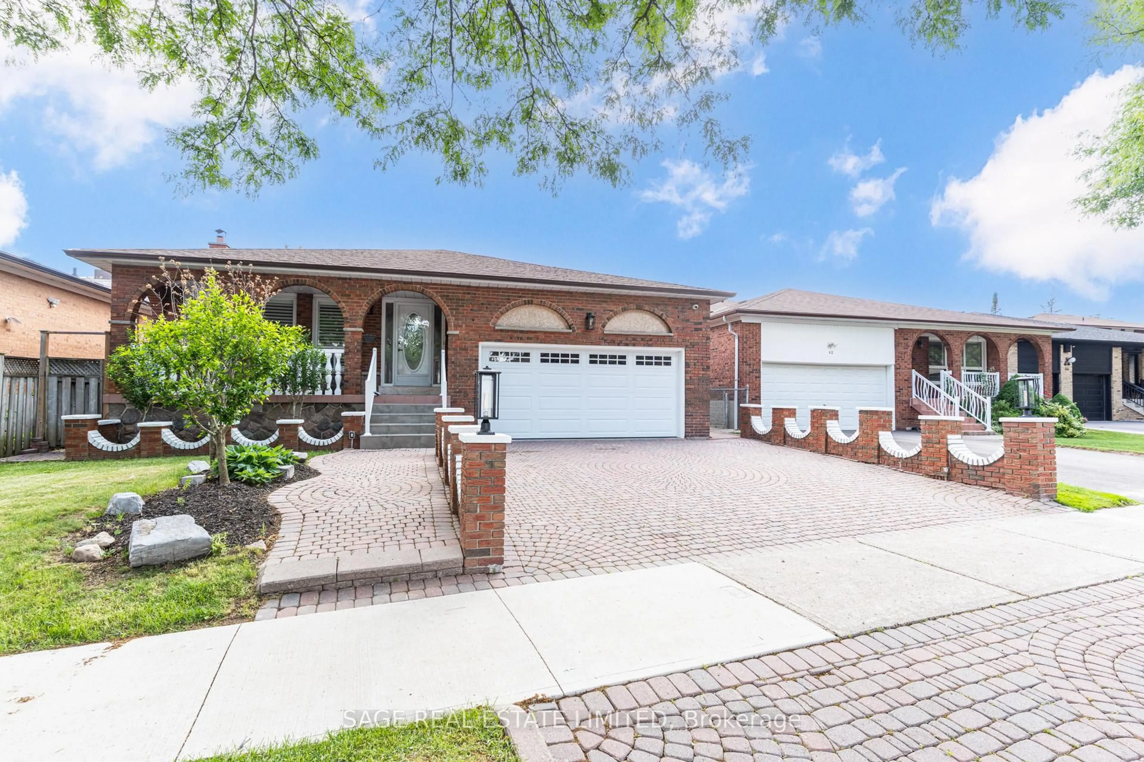 Home with brick exterior material, street for 40 Beamsville Dr, Toronto Ontario M1T 3S2