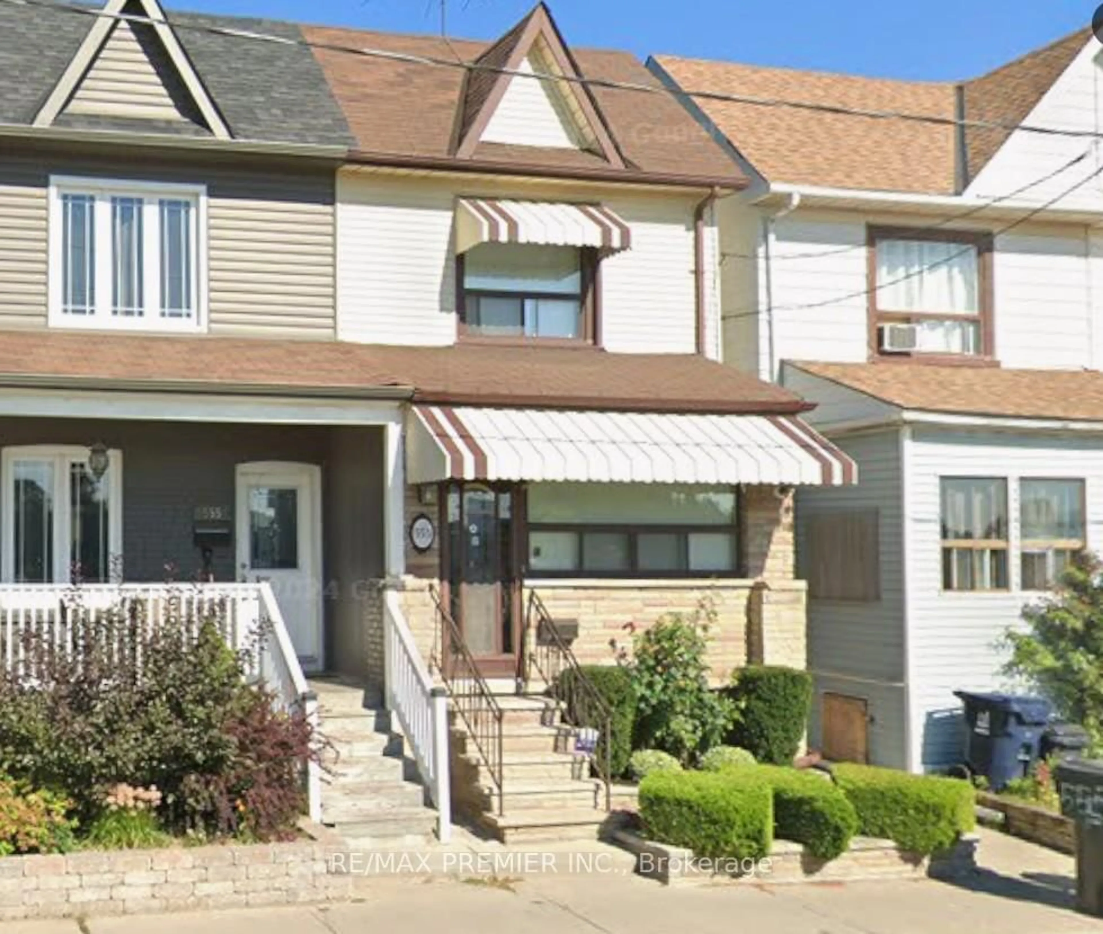 Home with vinyl exterior material, street for 553 Greenwood Ave, Toronto Ontario M4J 4A7