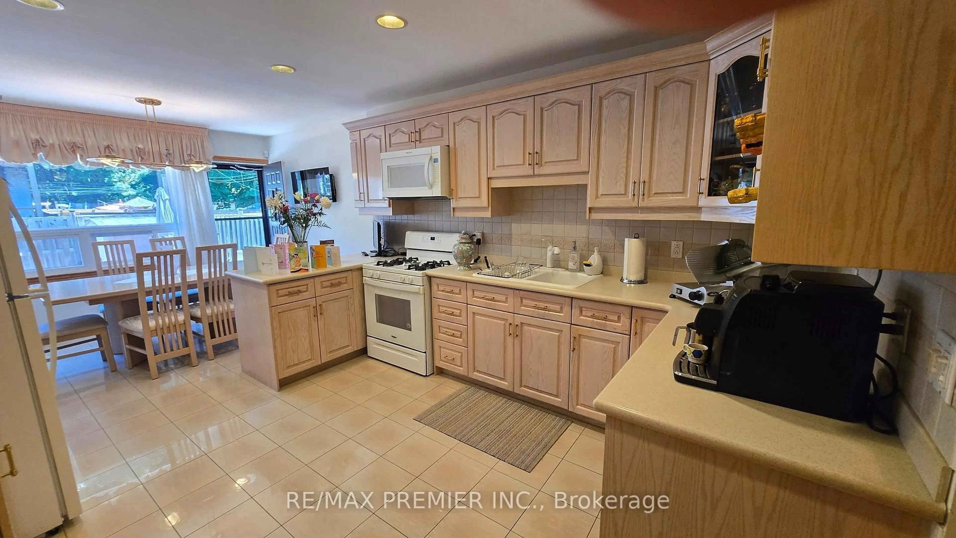 Standard kitchen, ceramic/tile floor for 553 Greenwood Ave, Toronto Ontario M4J 4A7