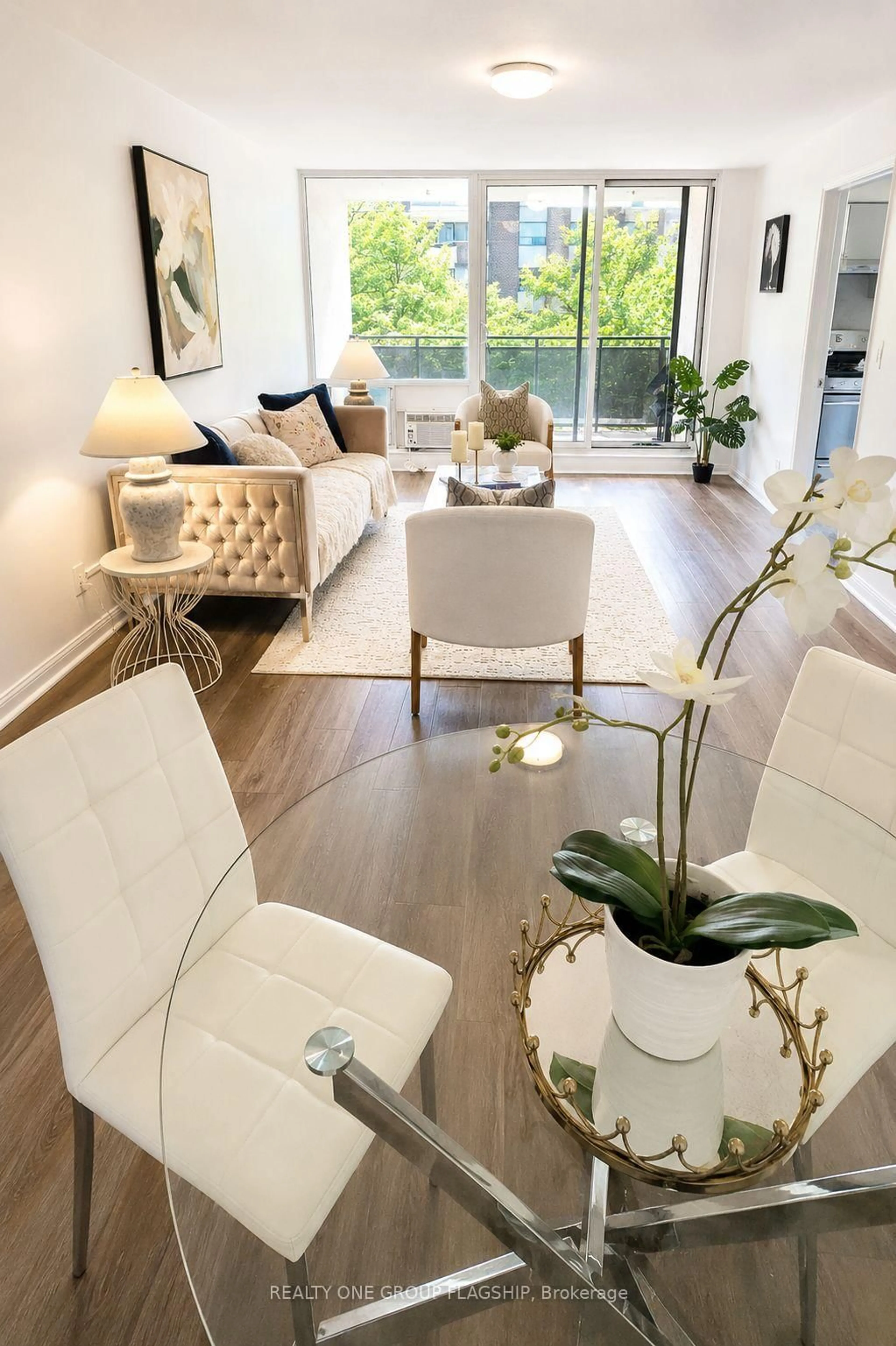 Living room with furniture, wood/laminate floor for 20 Gilder Dr Dr #505, Toronto Ontario M1K 5E1
