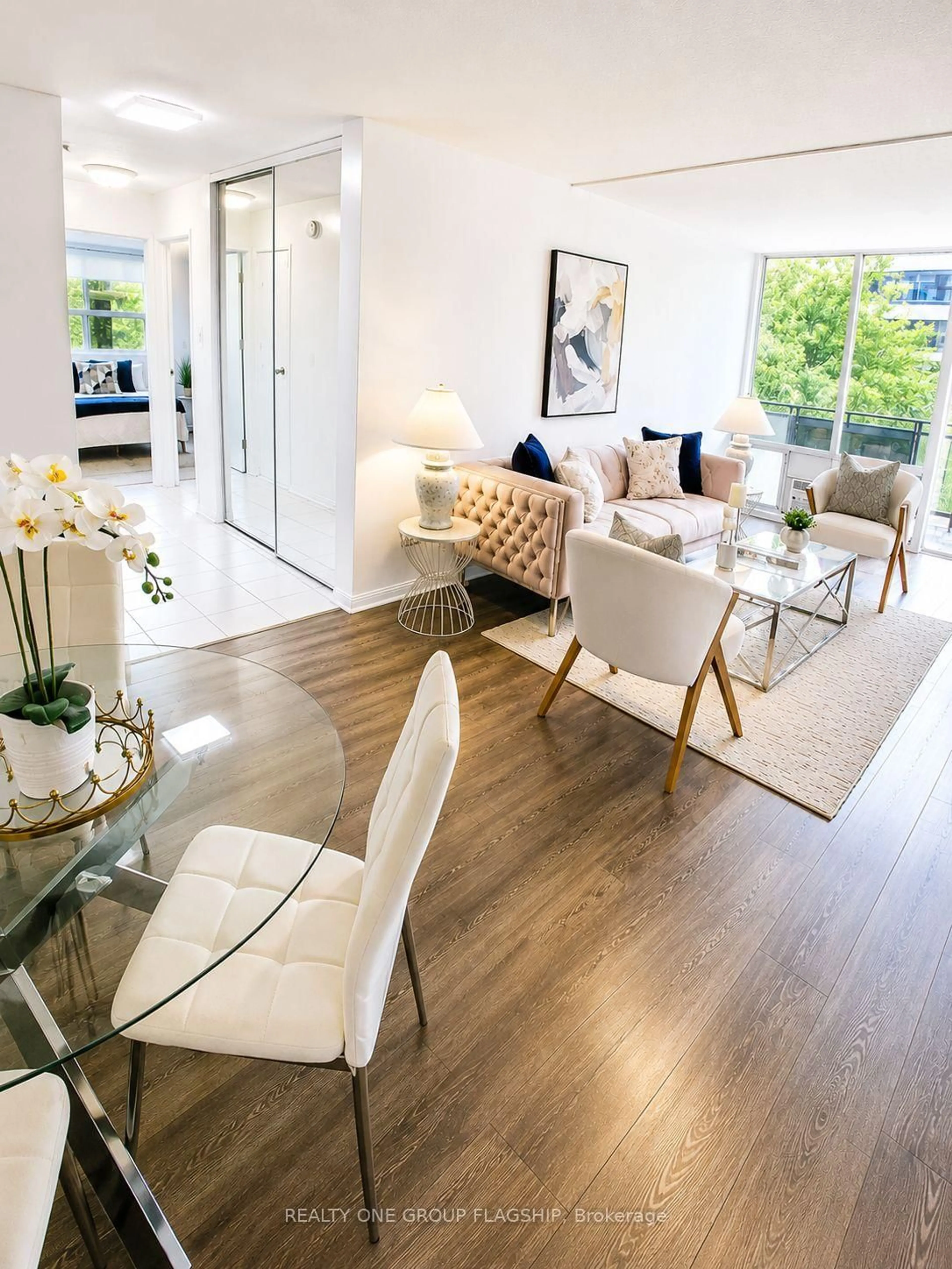 Living room with furniture, wood/laminate floor for 20 Gilder Dr Dr #505, Toronto Ontario M1K 5E1