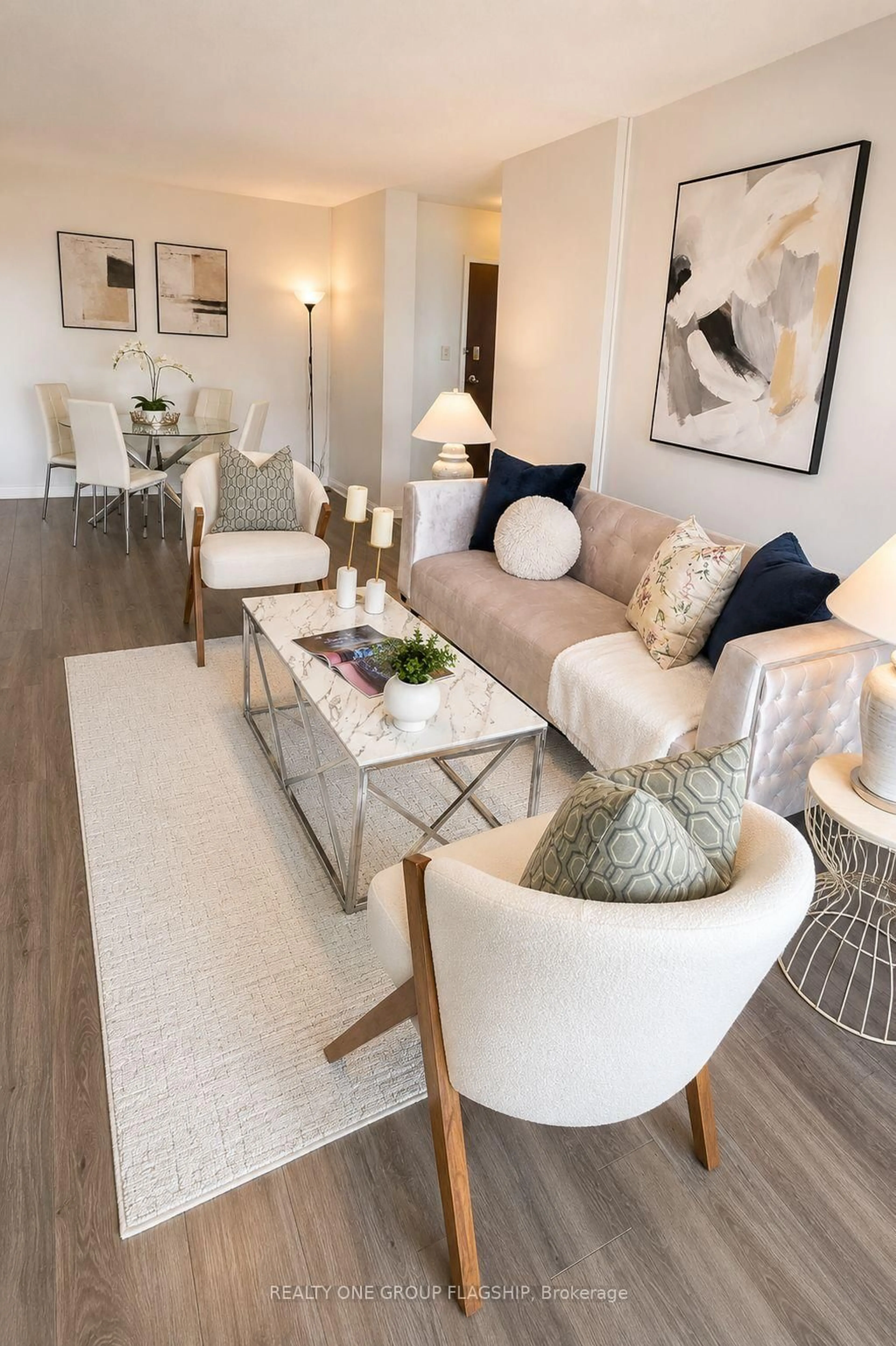 Living room with furniture, wood/laminate floor for 20 Gilder Dr Dr #505, Toronto Ontario M1K 5E1