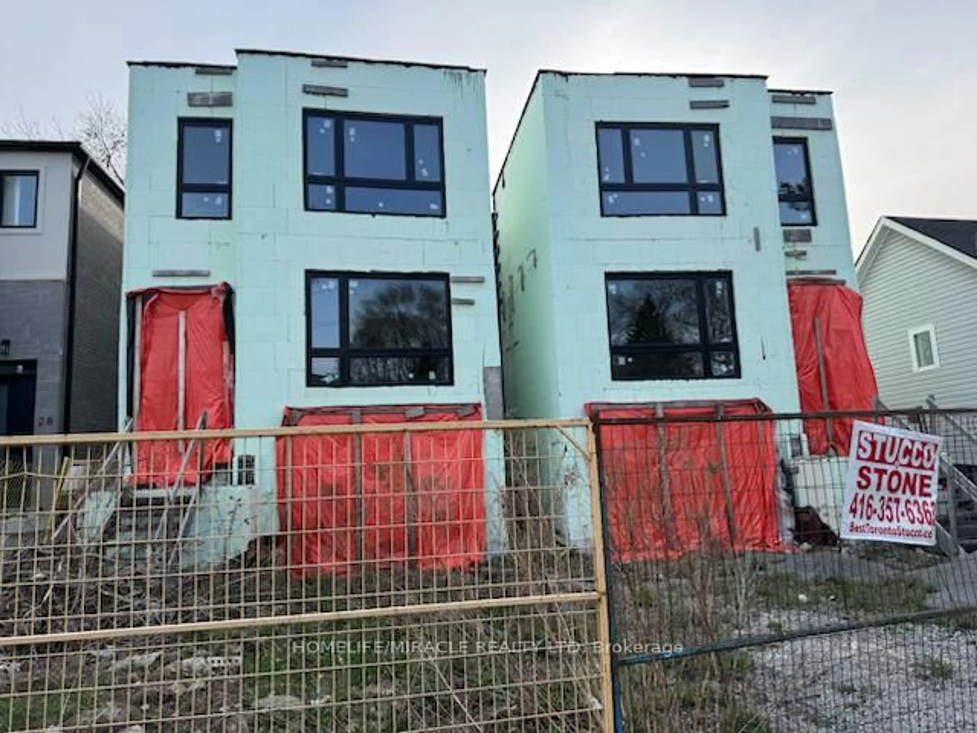 A pic from outside/outdoor area/front of a property/back of a property/a pic from drone, building for 40 August Ave, Toronto Ontario M1L 3M9