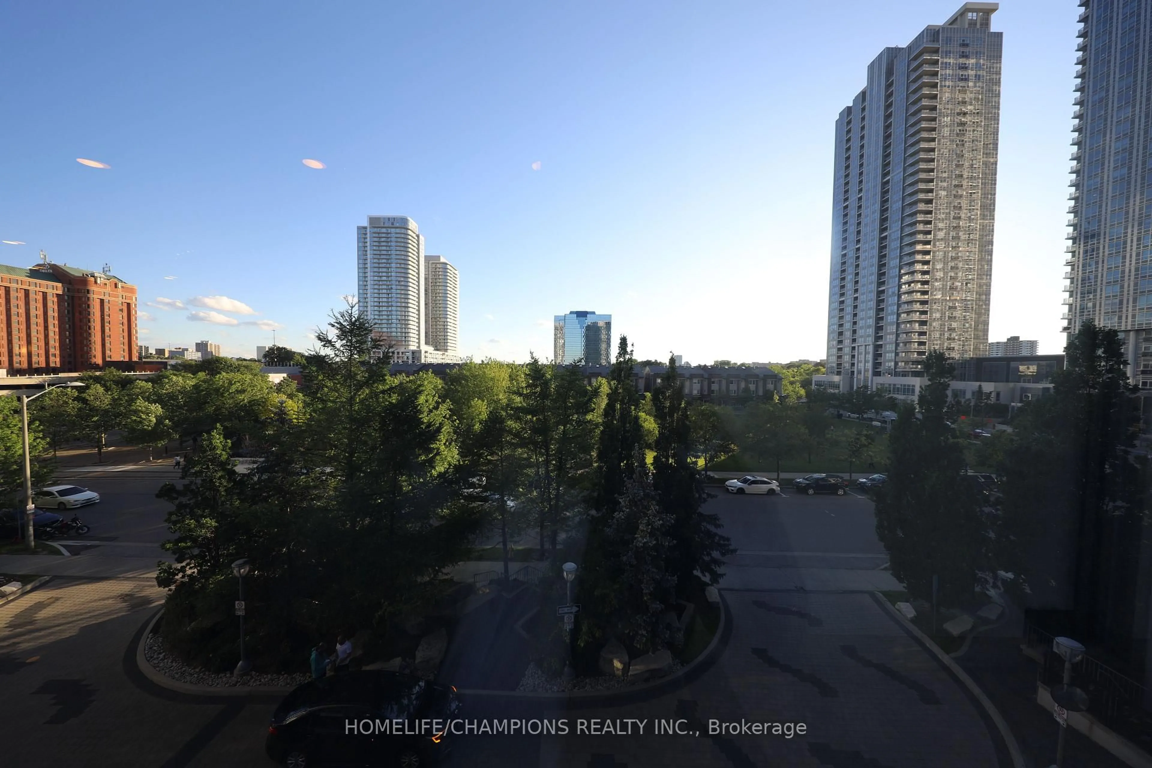 A pic from outside/outdoor area/front of a property/back of a property/a pic from drone, city buildings view from balcony for 151 Village Green Sq #403, Toronto Ontario M1S 0K5