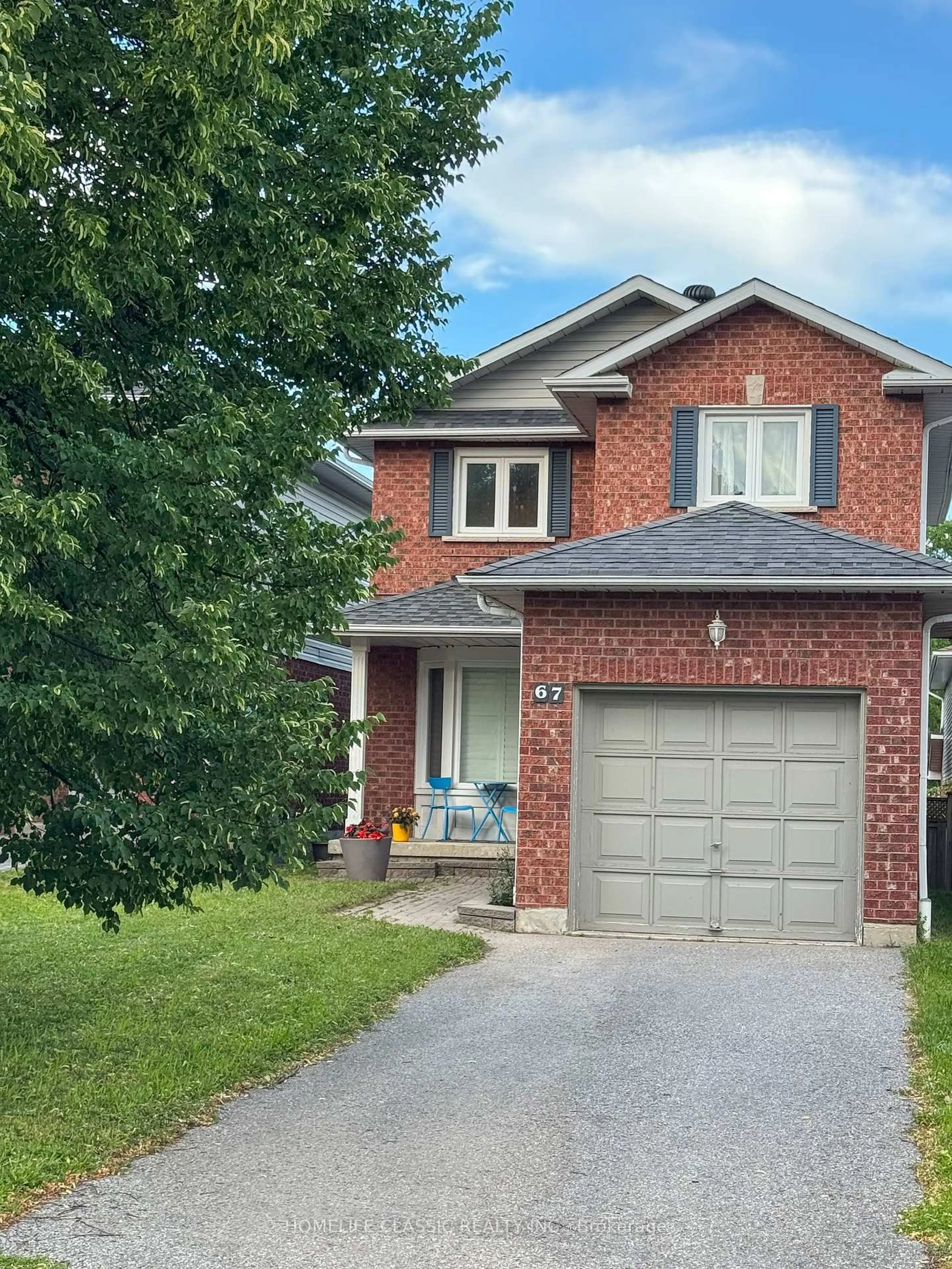 Home with brick exterior material, street for 67 Andona Cres, Toronto Ontario M1C 5A3