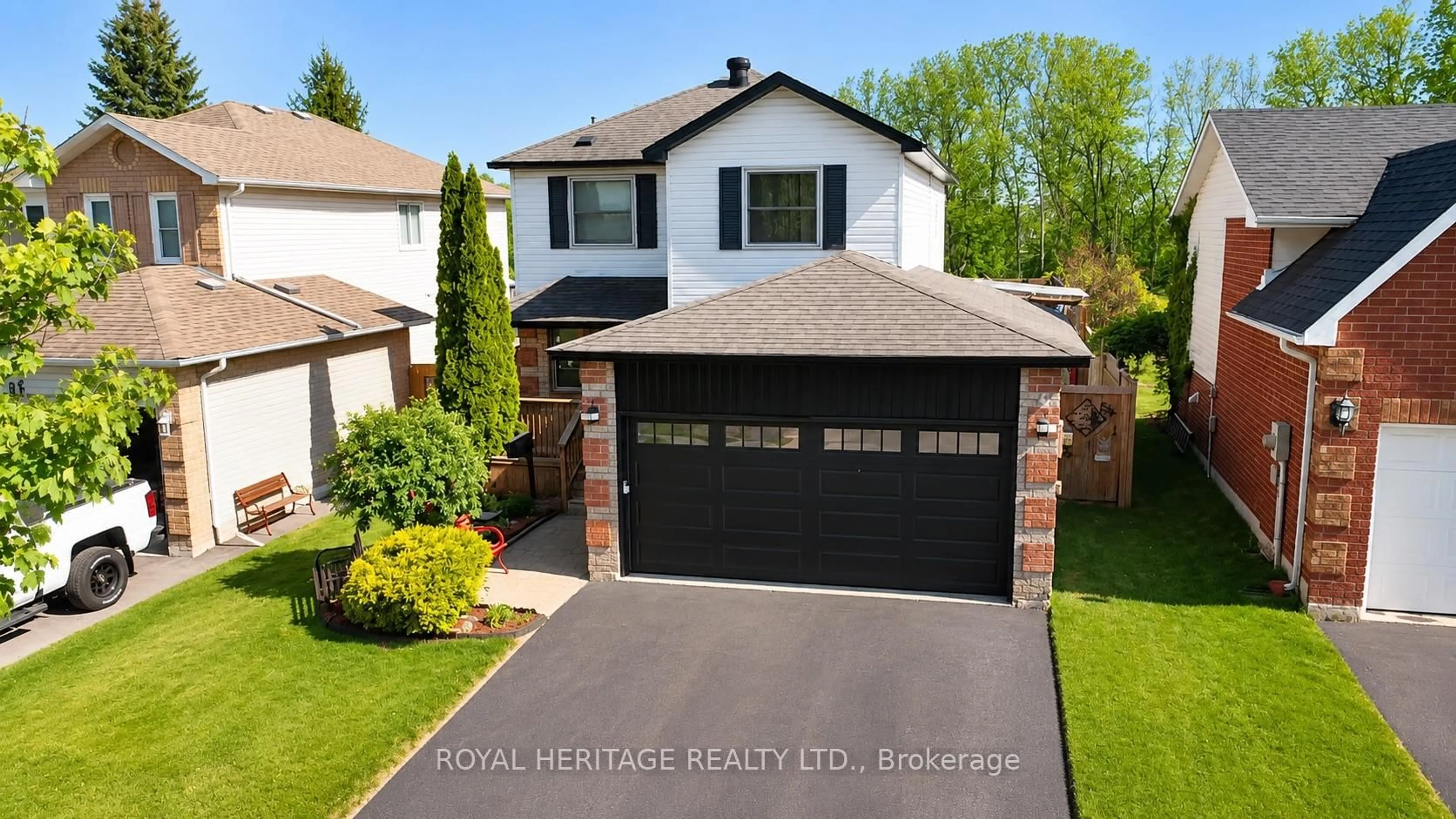 Home with vinyl exterior material, street for 23 Hooper Sq, Clarington Ontario L1C 4X7