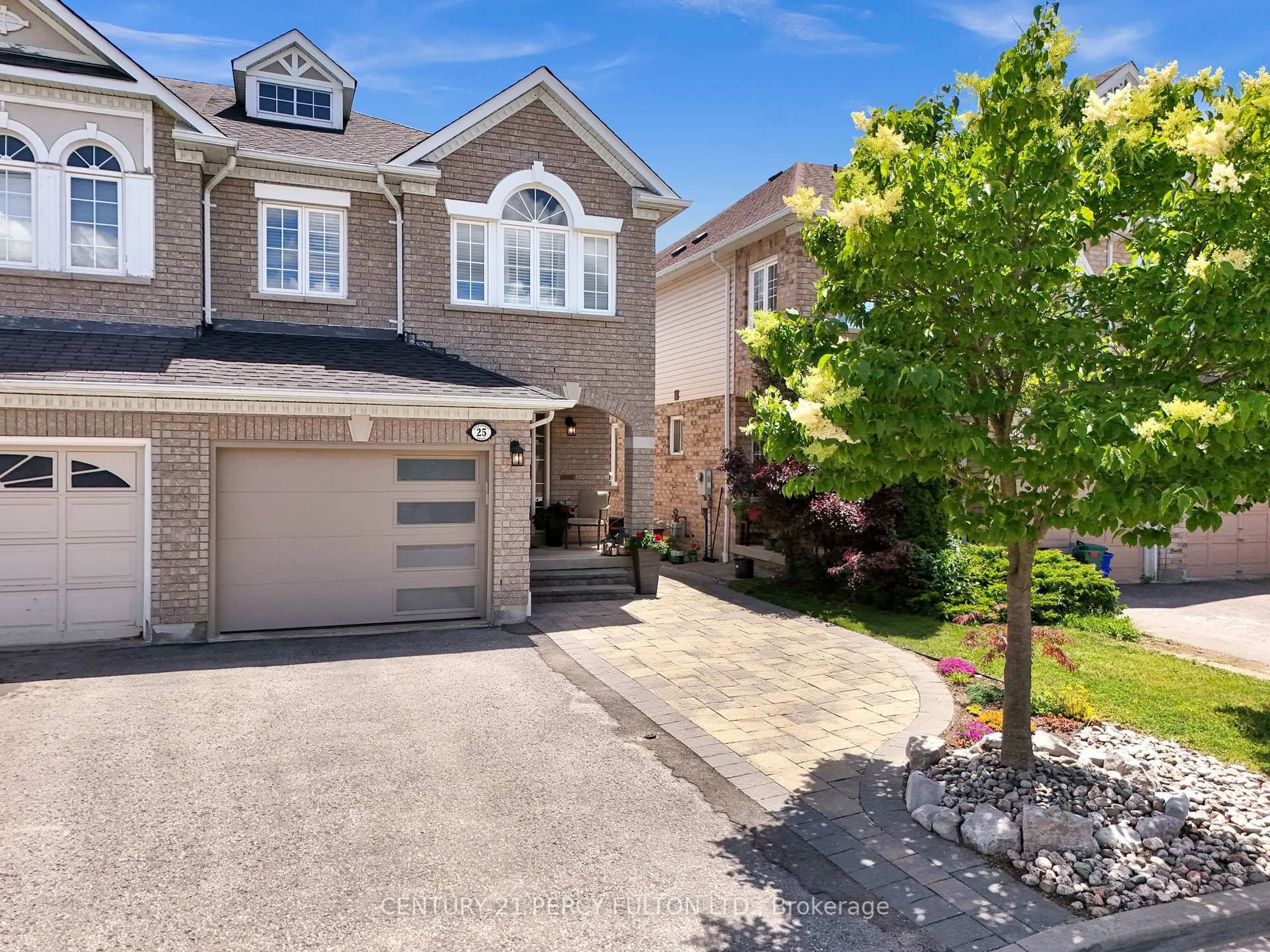 Home with brick exterior material, street for 25 Jonesridge Dr, Ajax Ontario L1T 4Z6