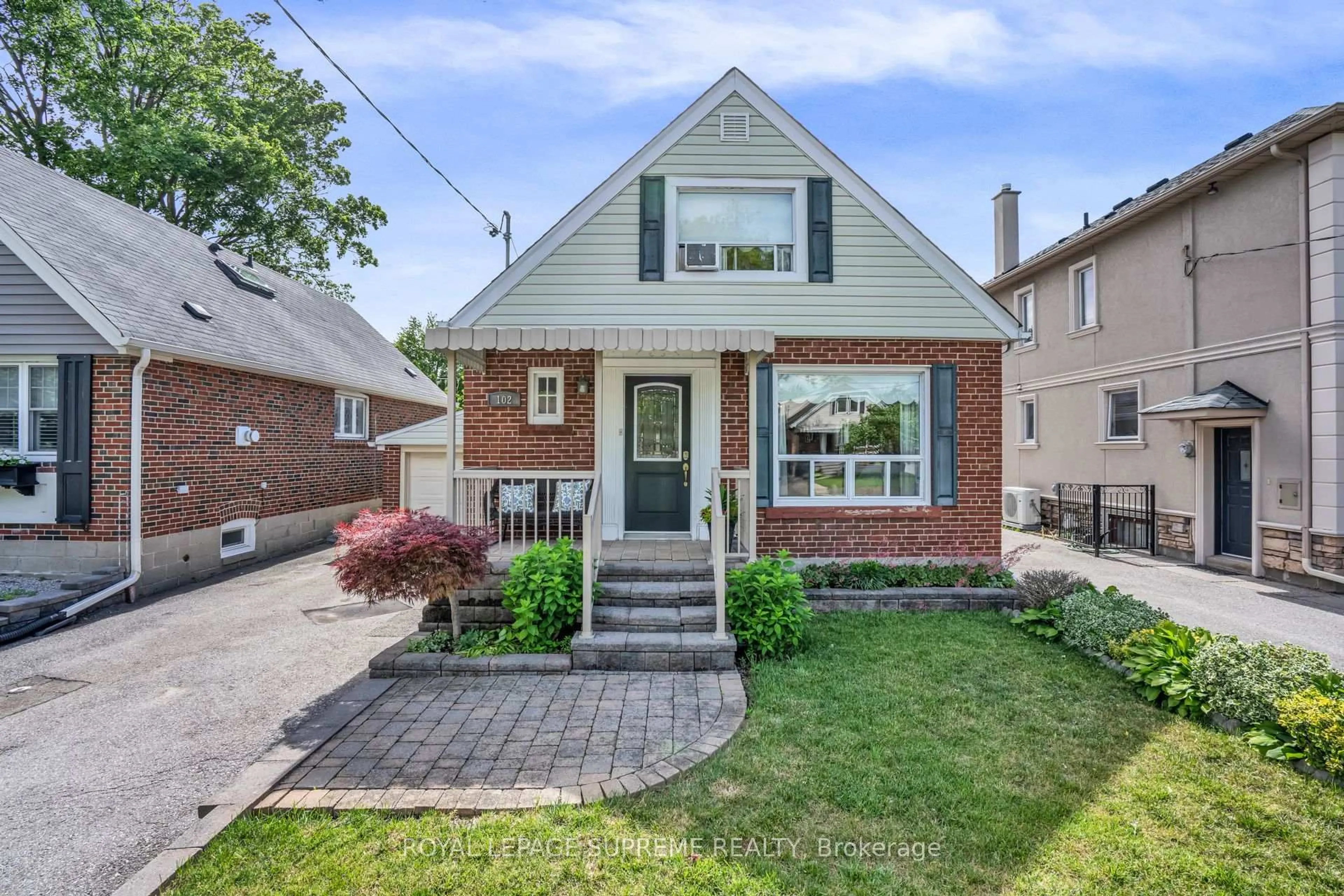 Home with brick exterior material, street for 102 Binswood Ave, Toronto Ontario M4C 3N9
