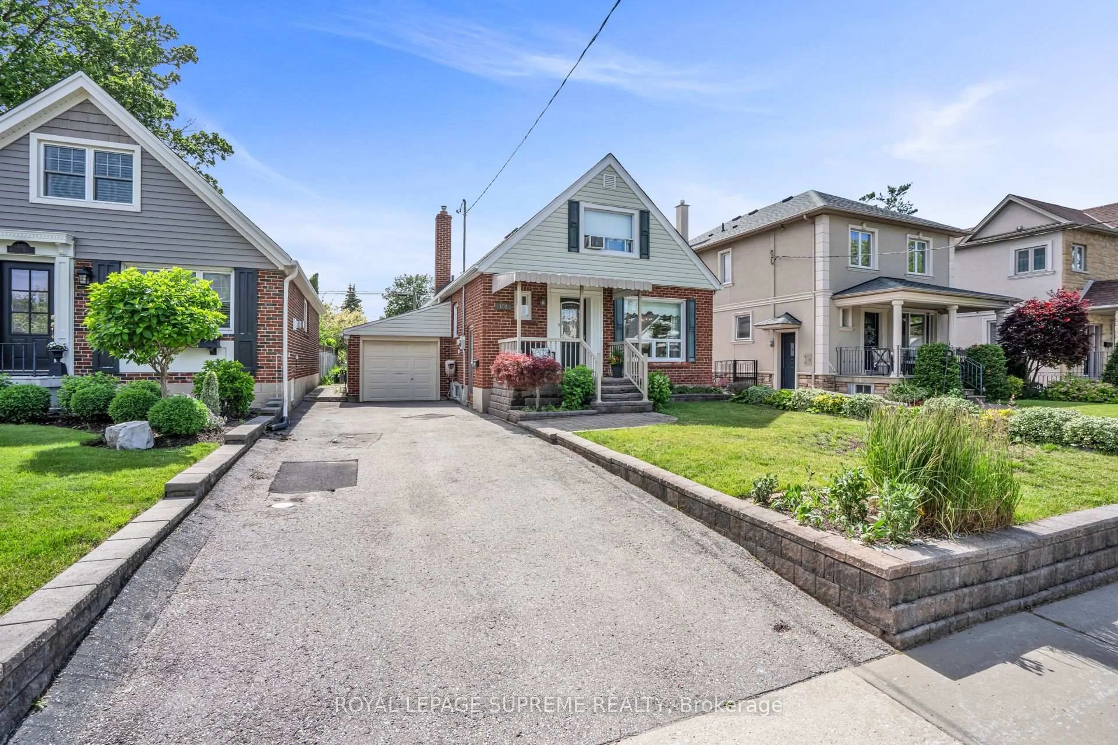 Home with brick exterior material, street for 102 Binswood Ave, Toronto Ontario M4C 3N9