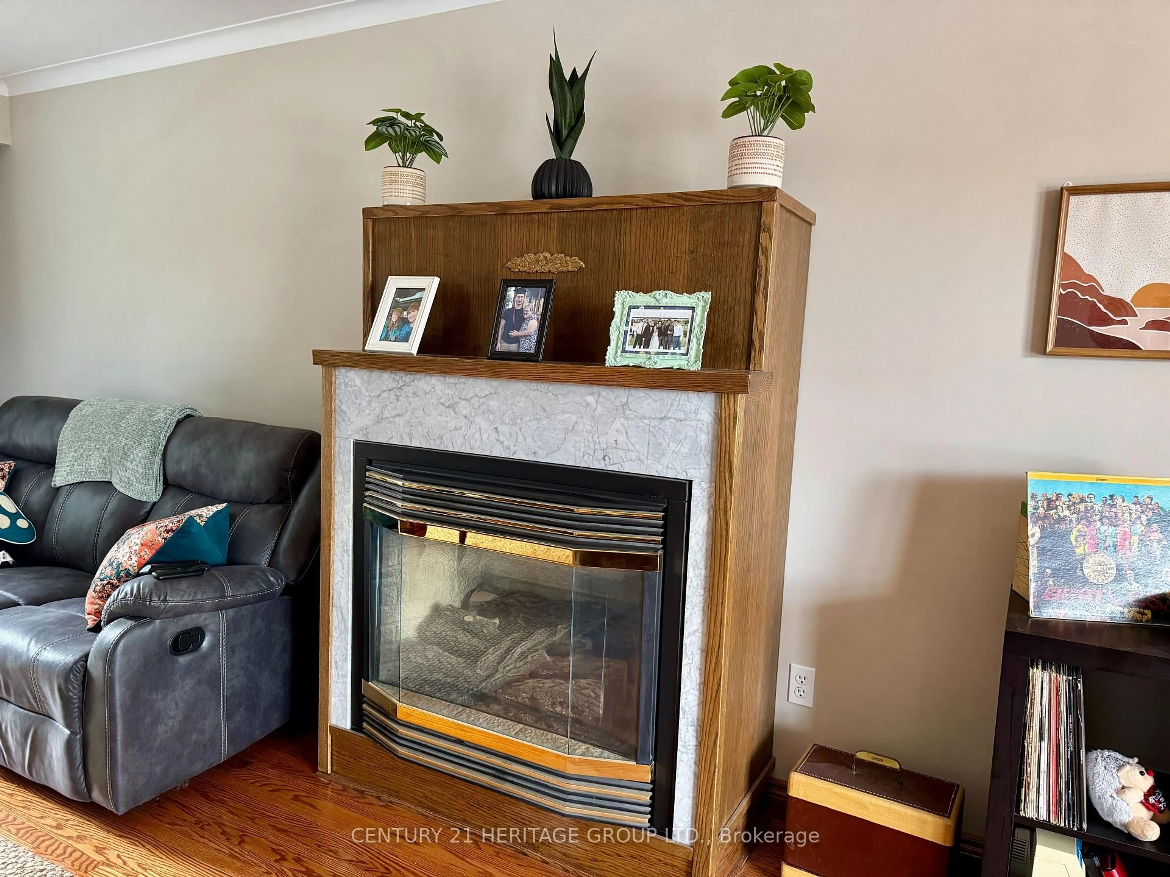 Living room with furniture, wood/laminate floor for 584 Arnhem Dr, Oshawa Ontario L1G 2J6