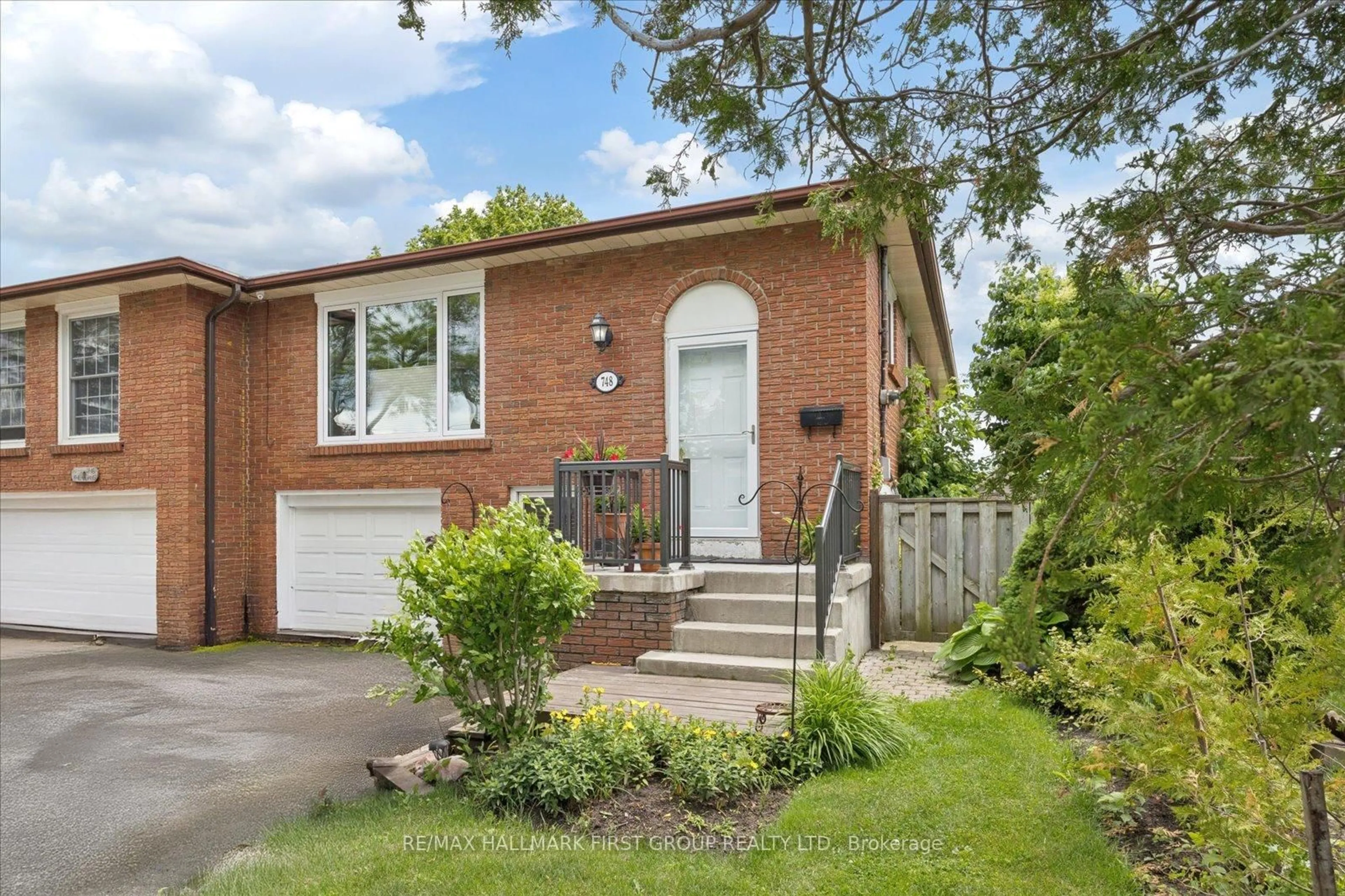 Home with brick exterior material, street for 748 Breezy Dr, Pickering Ontario L1W 2X7