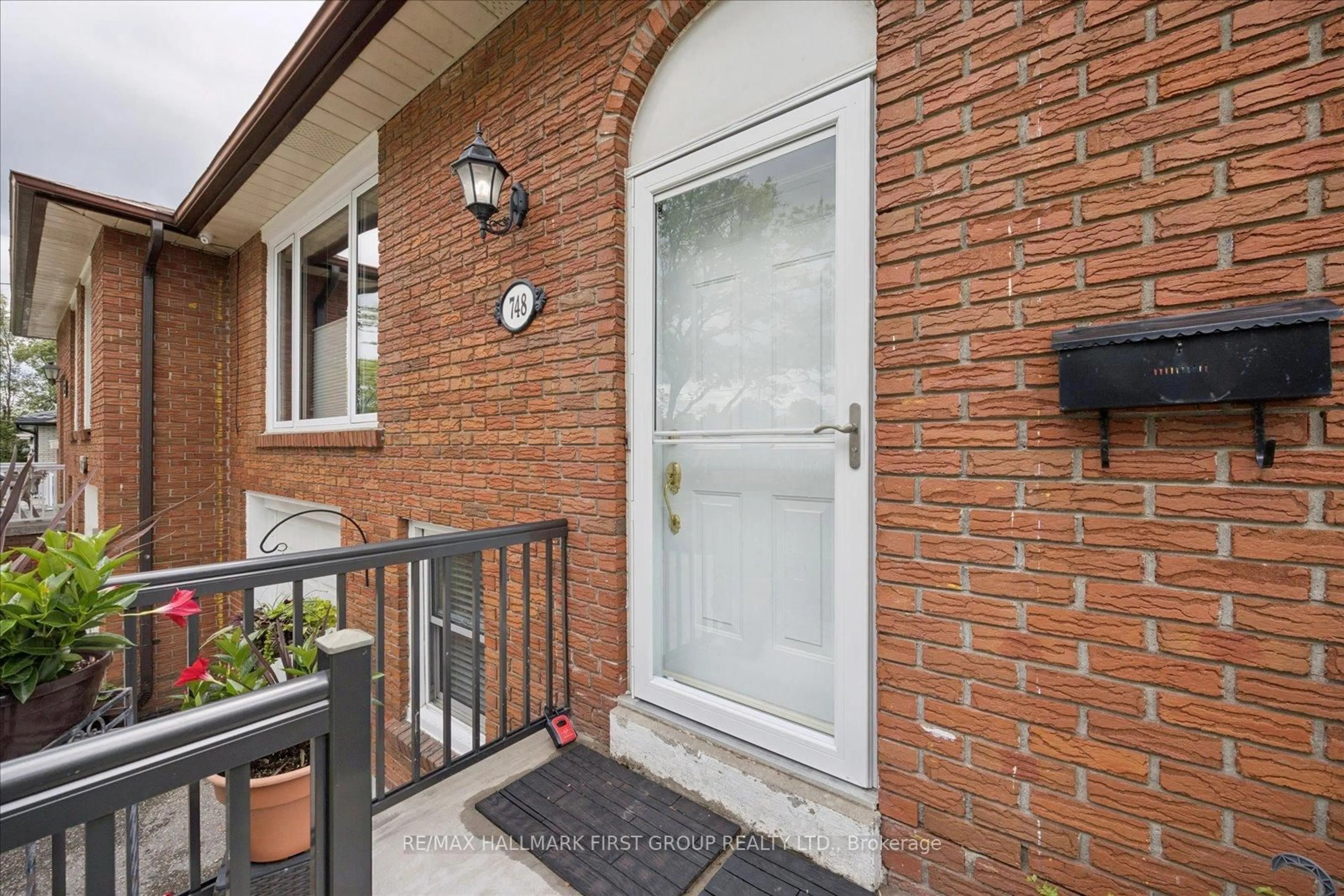 Home with brick exterior material, street for 748 Breezy Dr, Pickering Ontario L1W 2X7