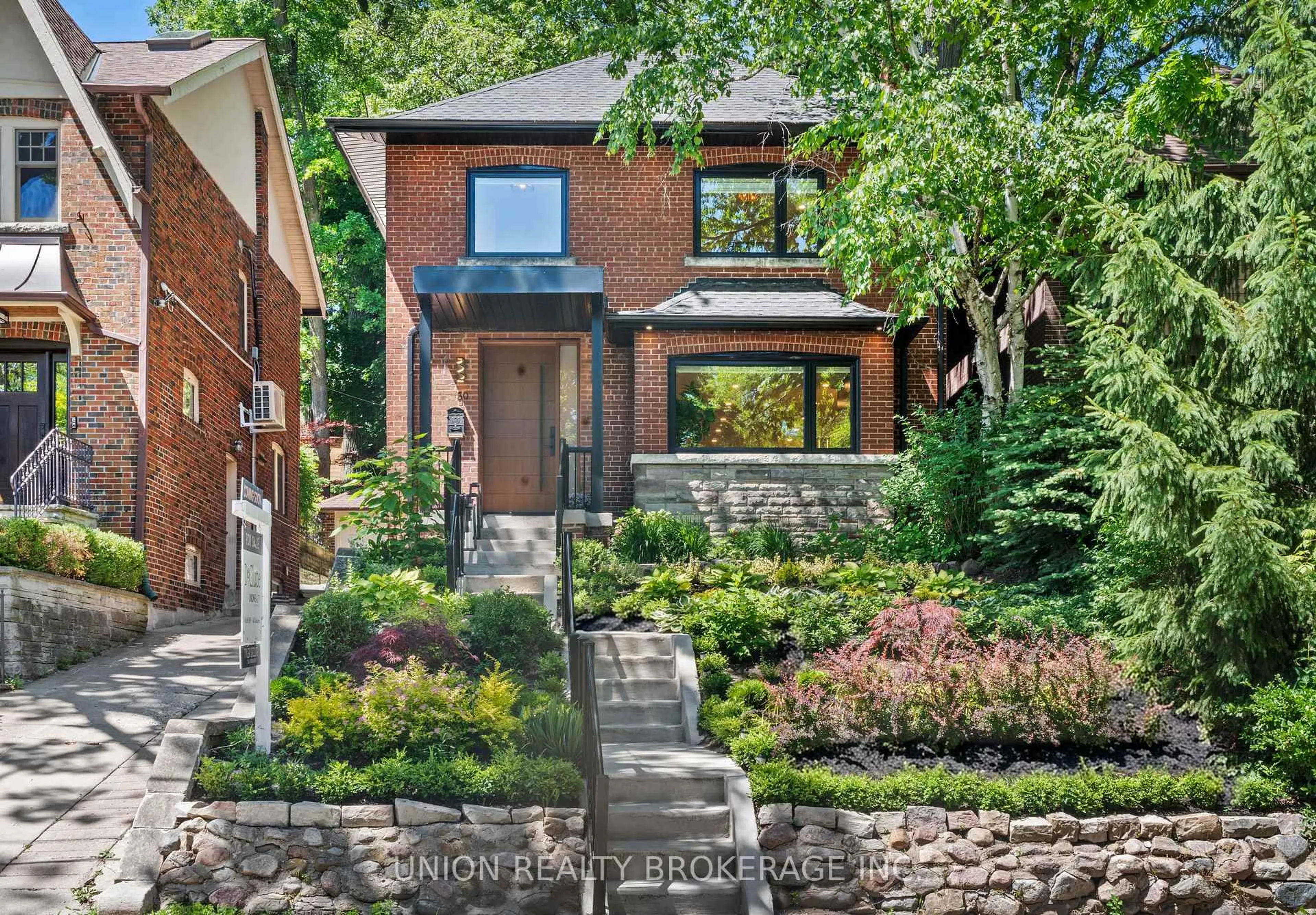 Home with brick exterior material, street for 50 Beaufort Rd, Toronto Ontario M4E 1M7