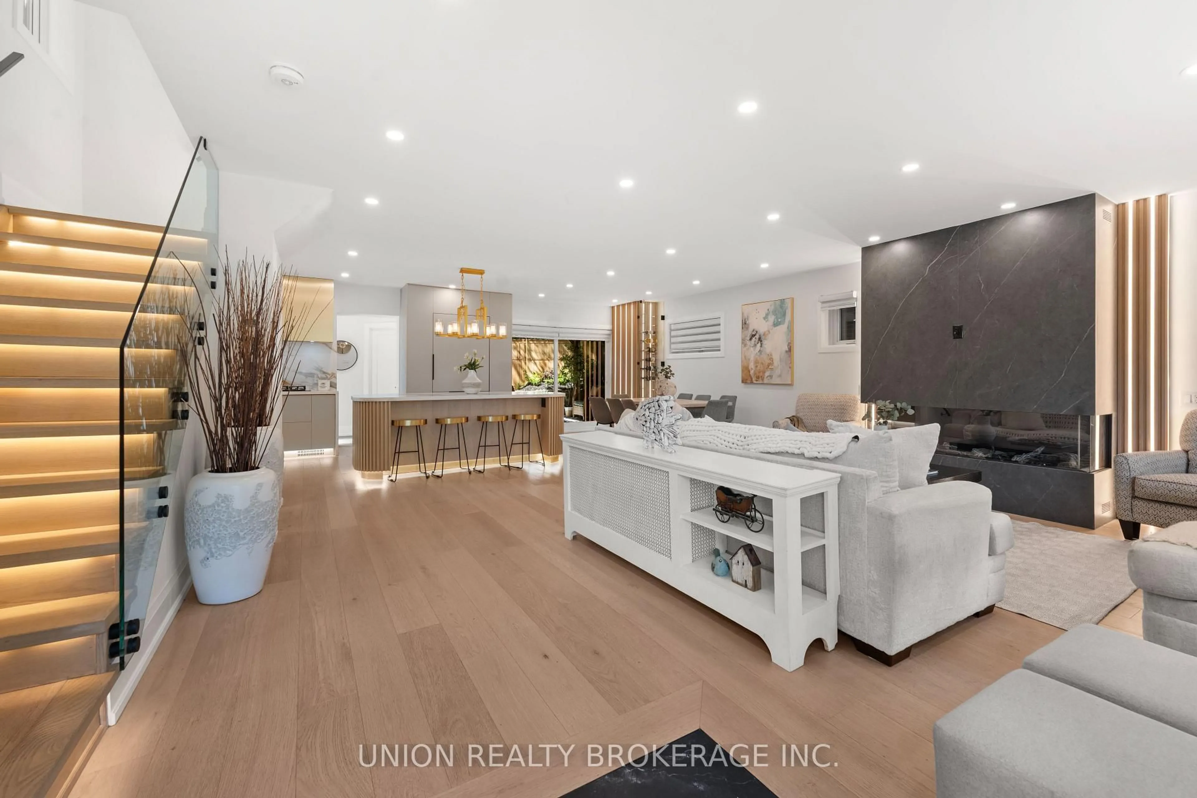 Open concept kitchen, wood/laminate floor for 50 Beaufort Rd, Toronto Ontario M4E 1M7