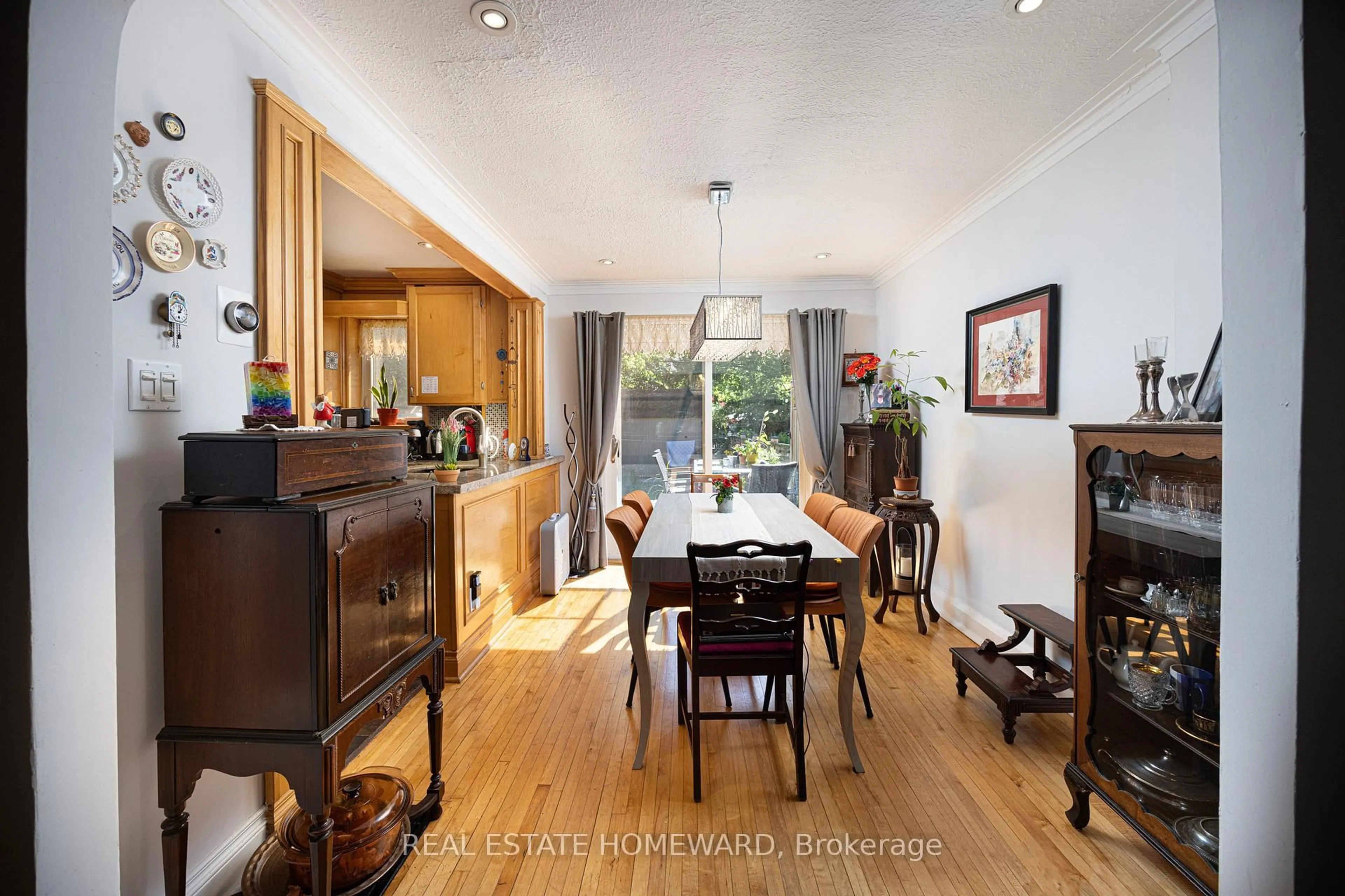 Dining room, wood/laminate floor for 69 Hertle Ave, Toronto Ontario M4L 2T3