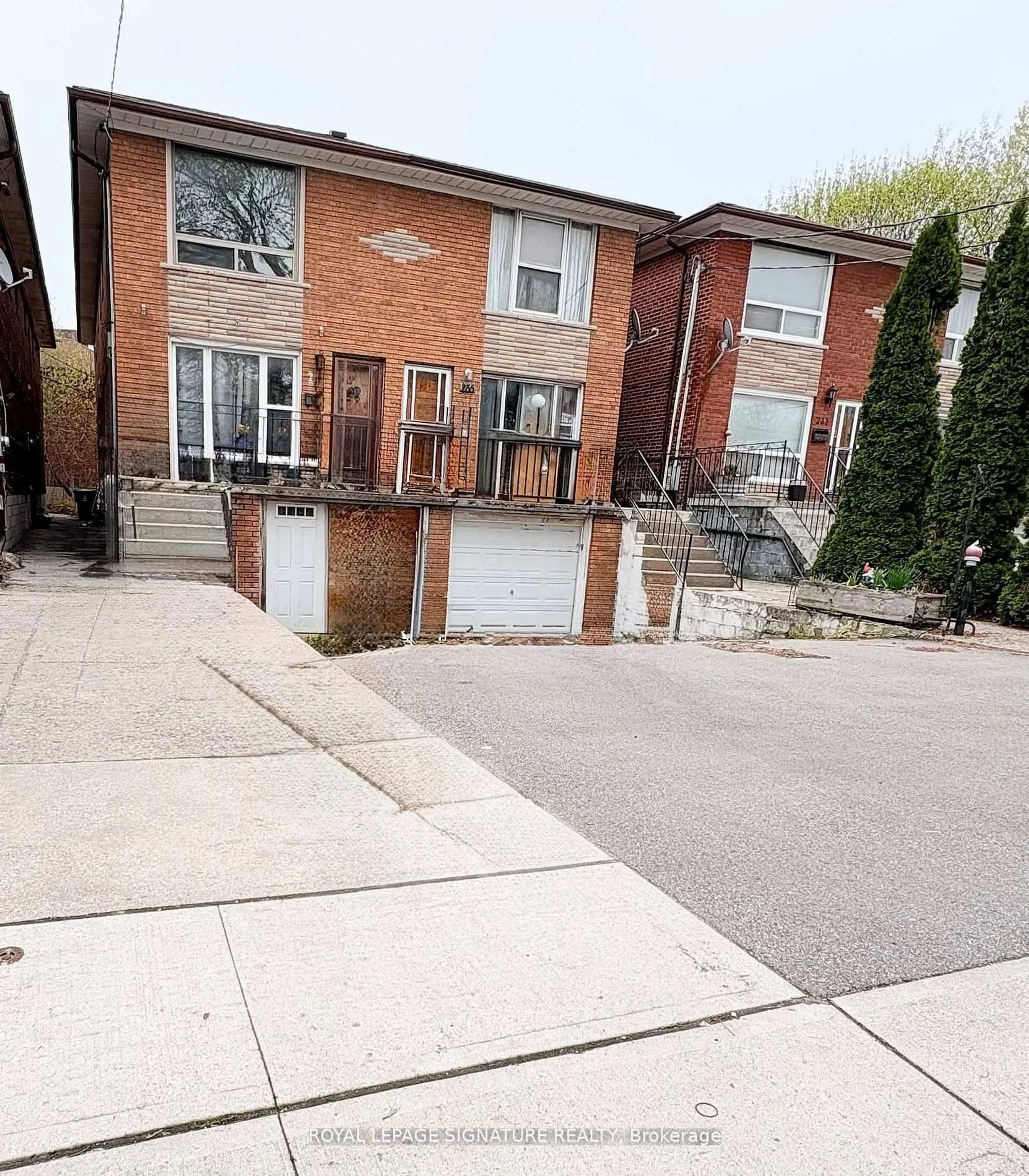 Home with brick exterior material, street for 237 Pickering St, Toronto Ontario M4E 3J9