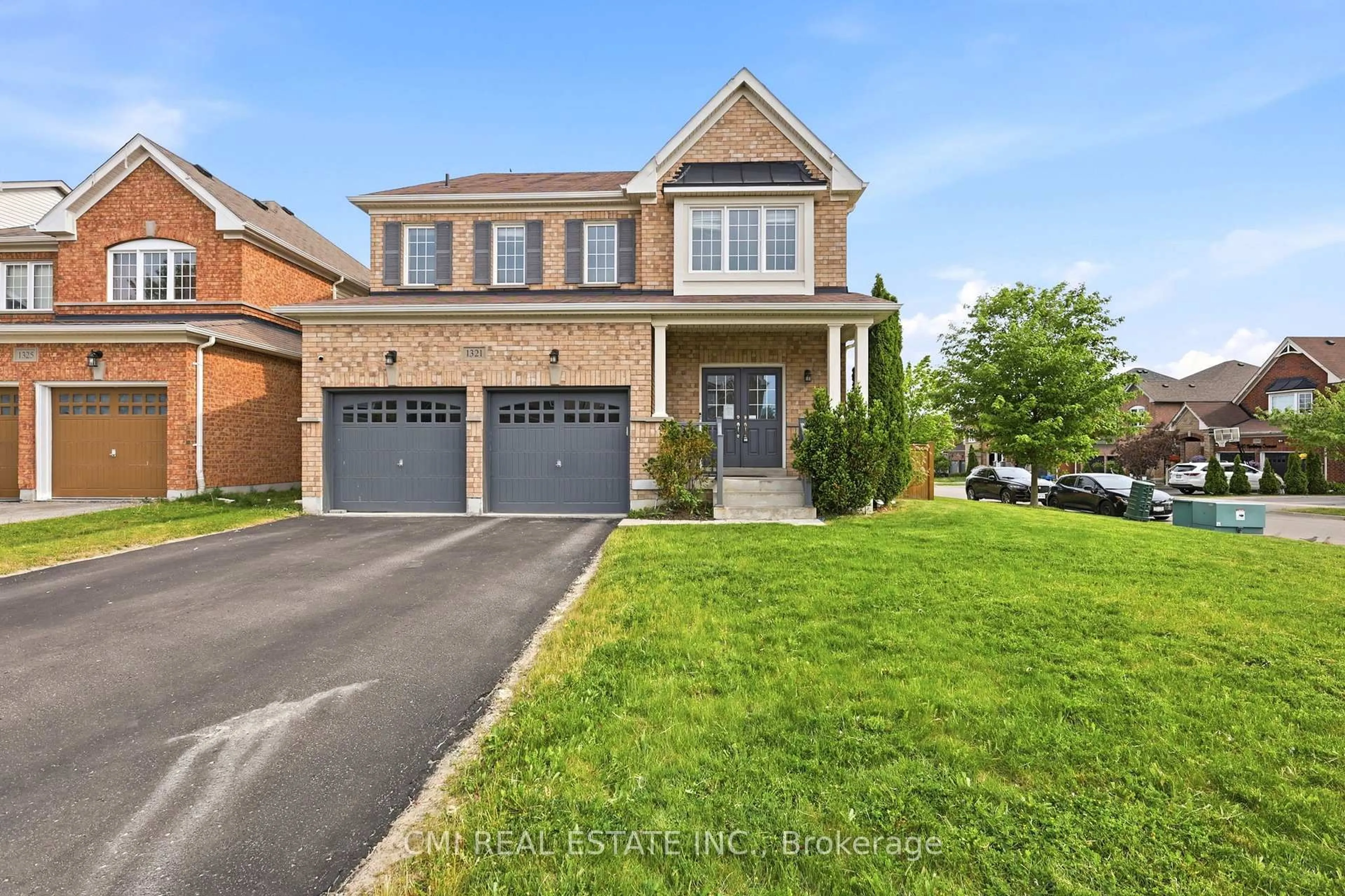 Home with brick exterior material, street for 1321 Kenmark Ave, Oshawa Ontario L1K 0N3