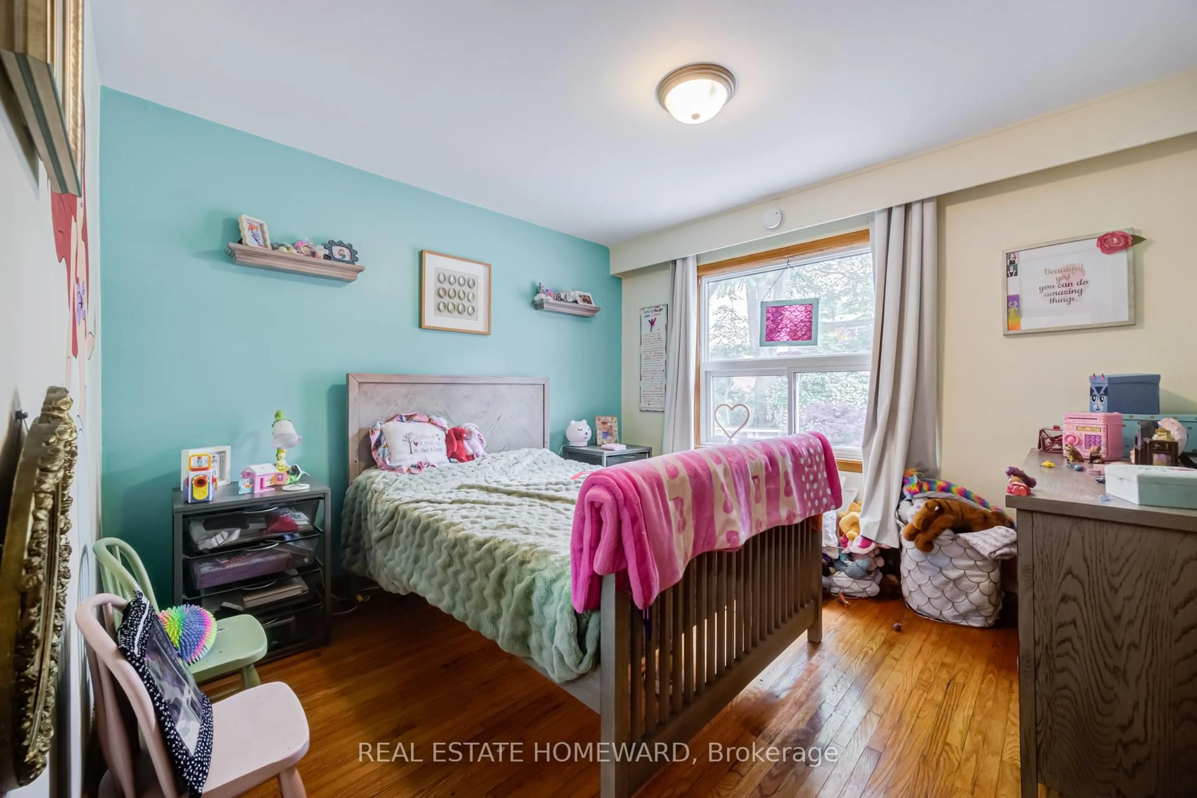 Bedroom with bed, wood/laminate floor for 170 Wheeler Ave, Toronto Ontario M4L 3V4