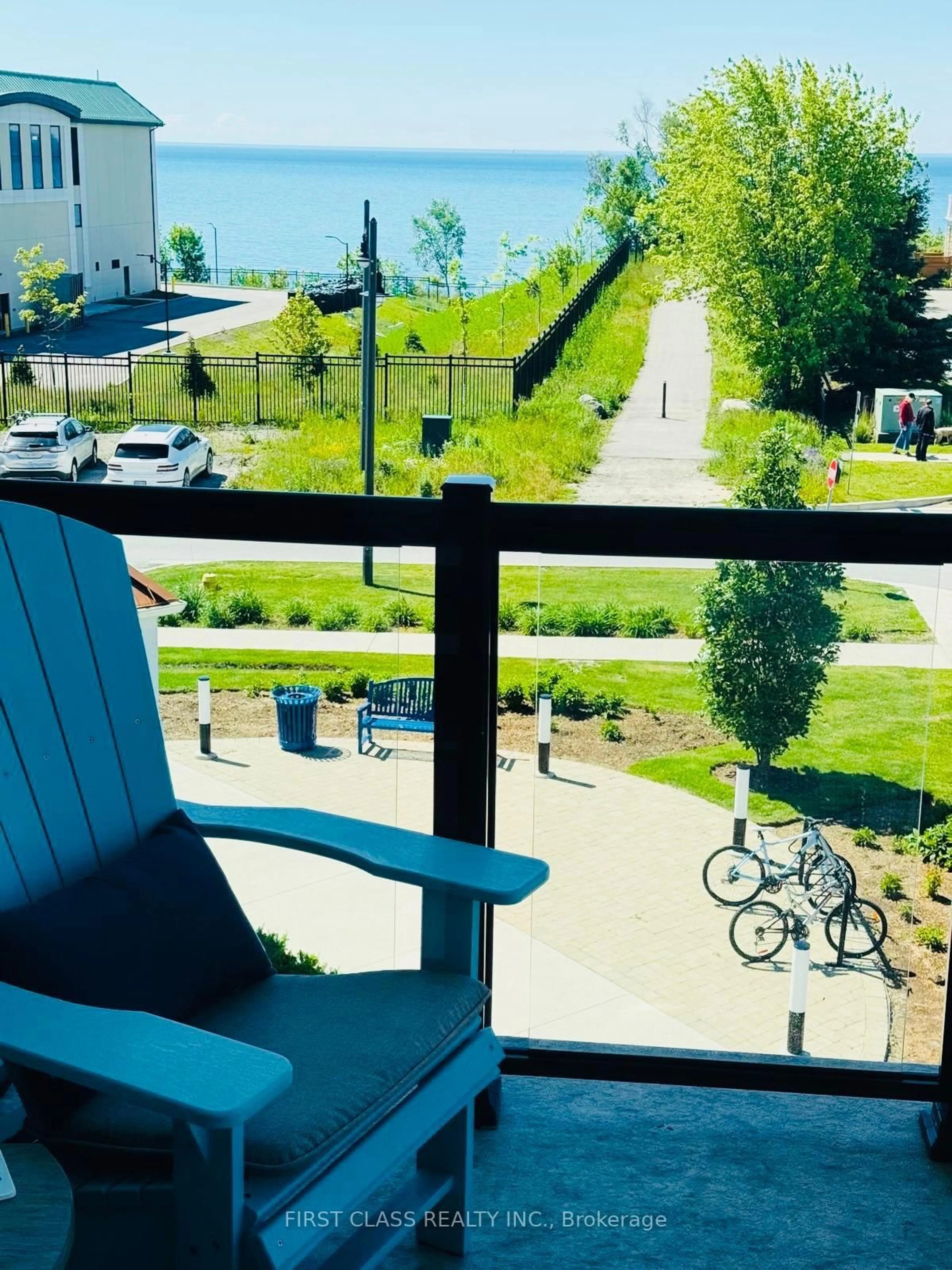 Patio, city buildings view from balcony for 50 Lakebreeze Dr #306, Clarington Ontario L1B 0V9
