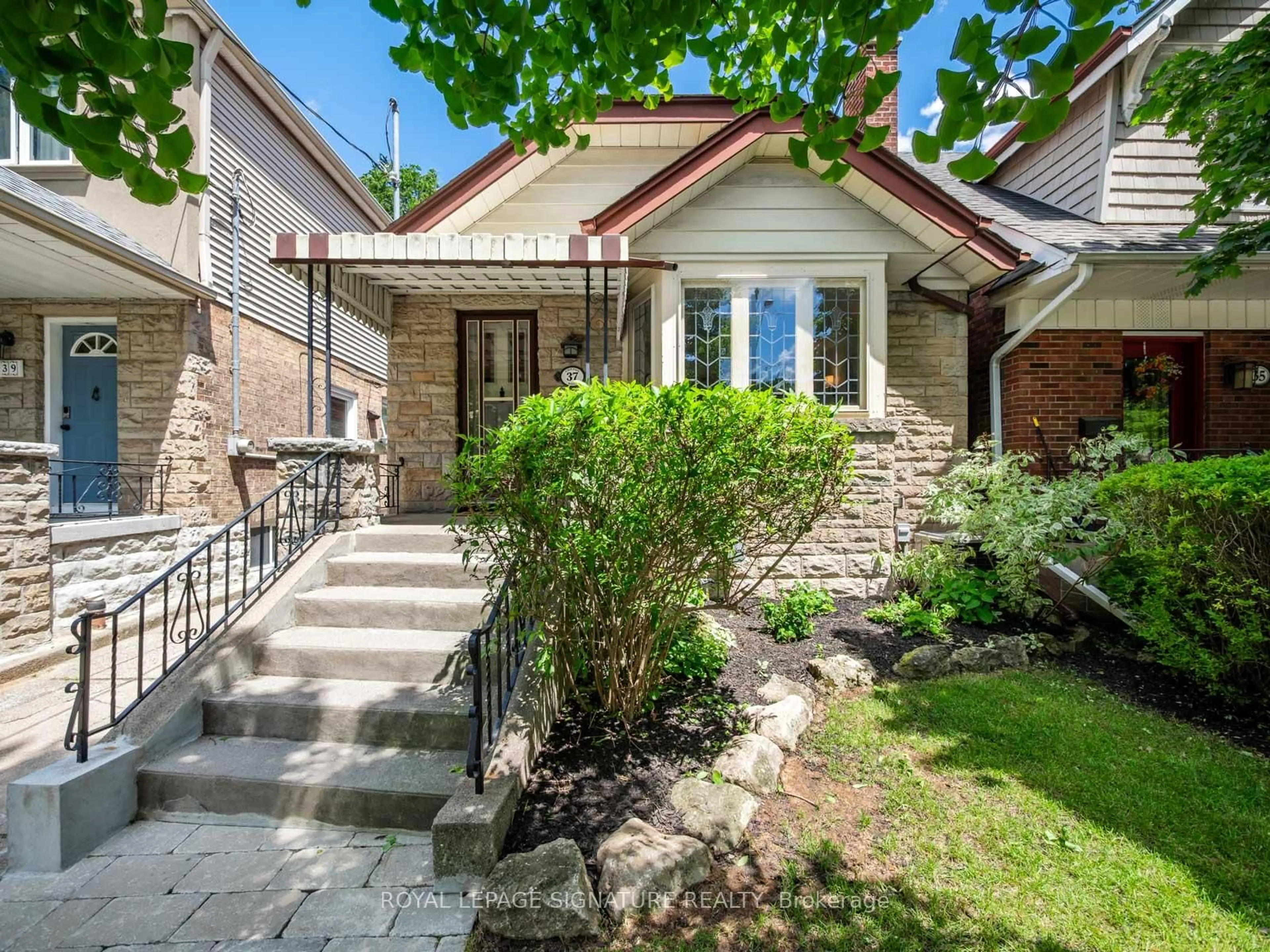 Home with brick exterior material, street for 37 Chilton Rd, Toronto Ontario M4J 3C7