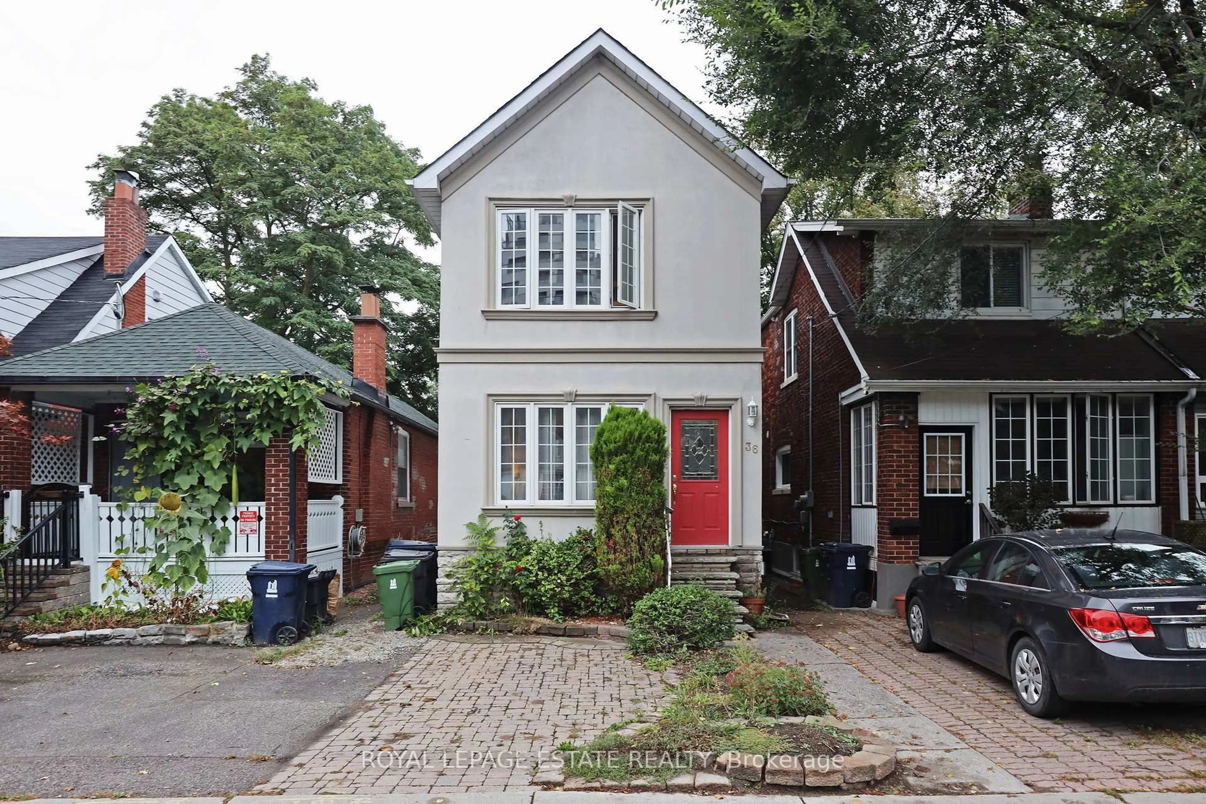 Home with brick exterior material, street for 36 Meadow Ave, Toronto Ontario M1N 1V6