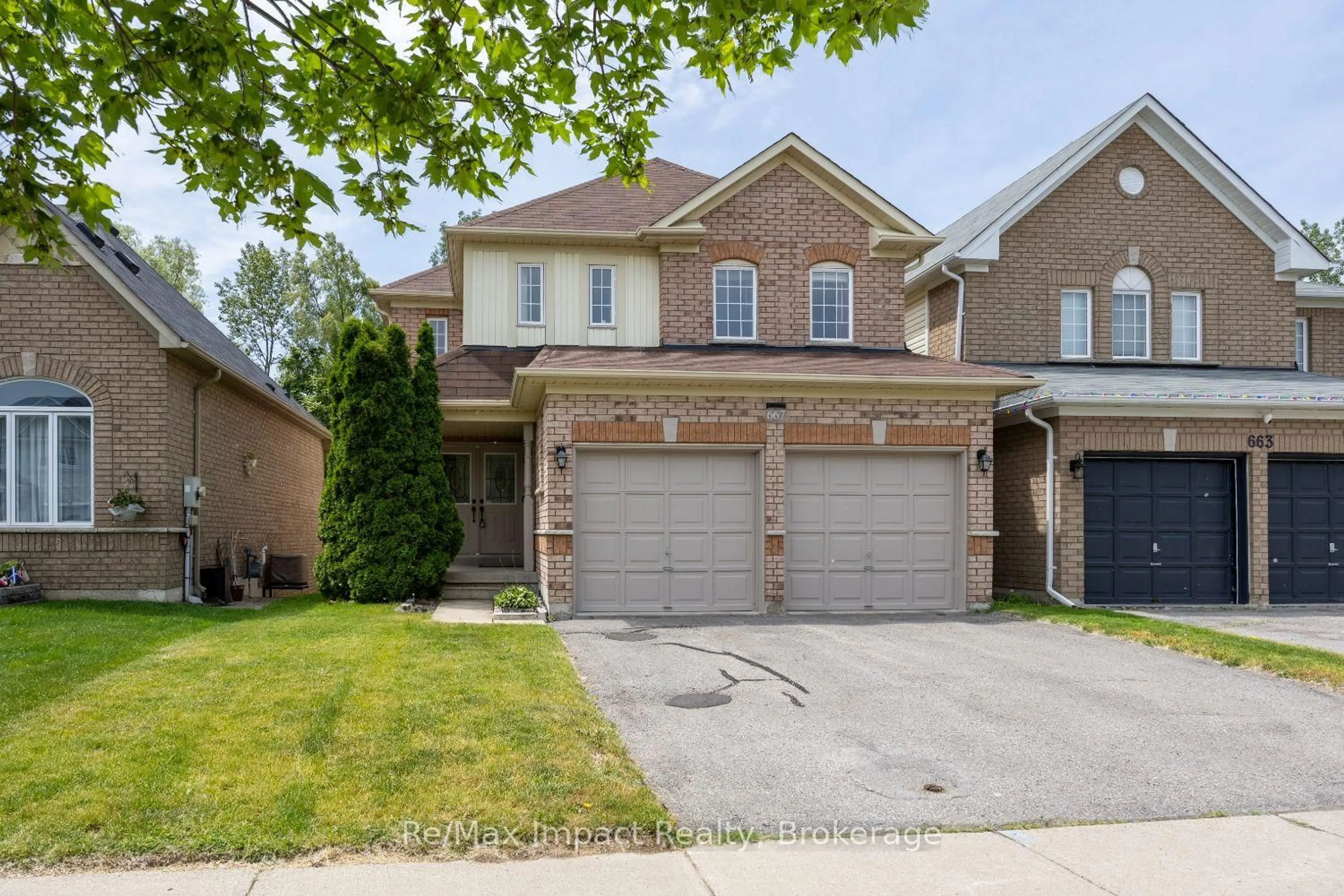 Home with brick exterior material, street for 667 Brasswinds Tr, Oshawa Ontario L1K 2Z2