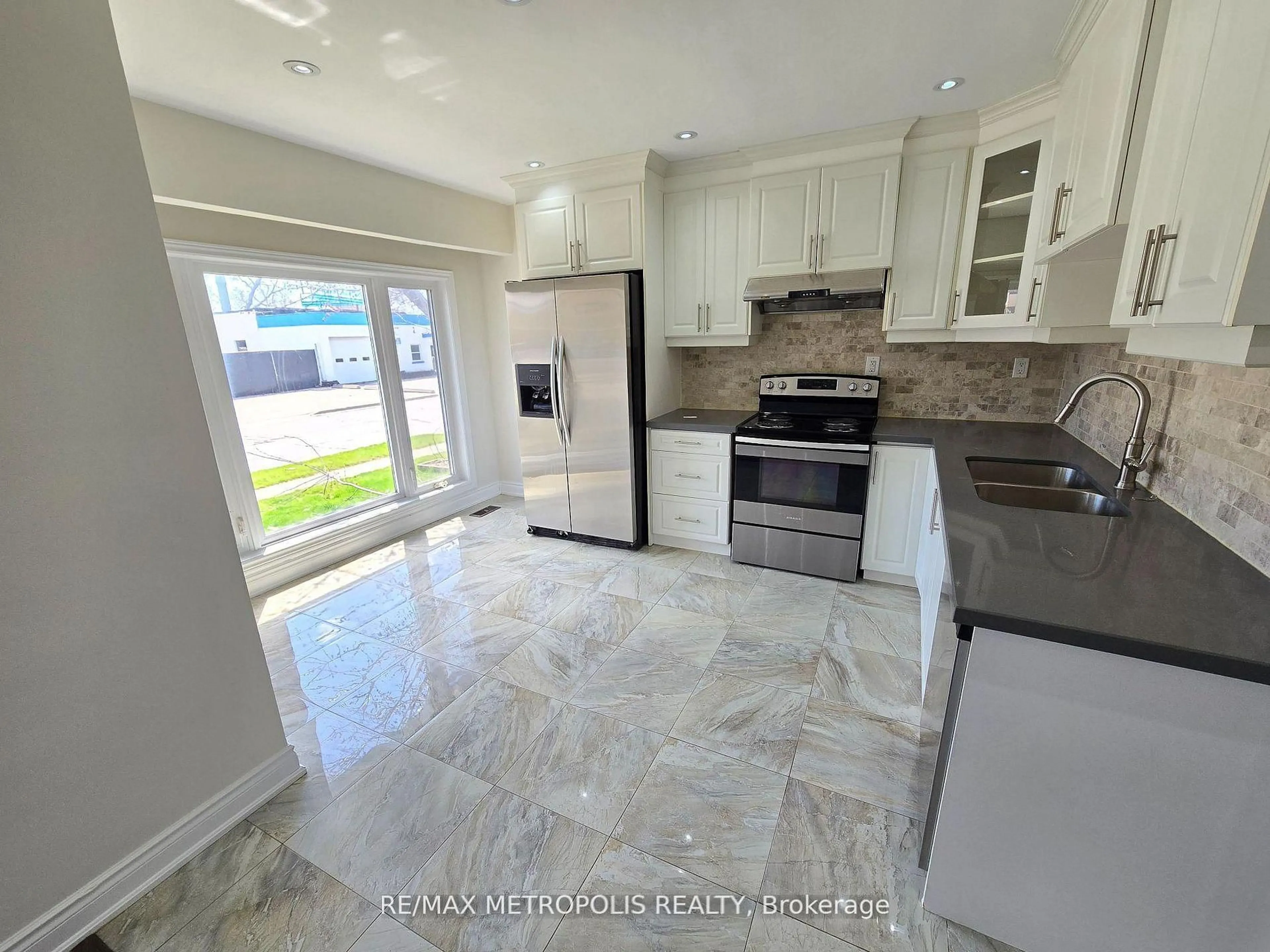 Open concept kitchen, ceramic/tile floor for 238 Toronto Ave, Oshawa Ontario L1H 3C1